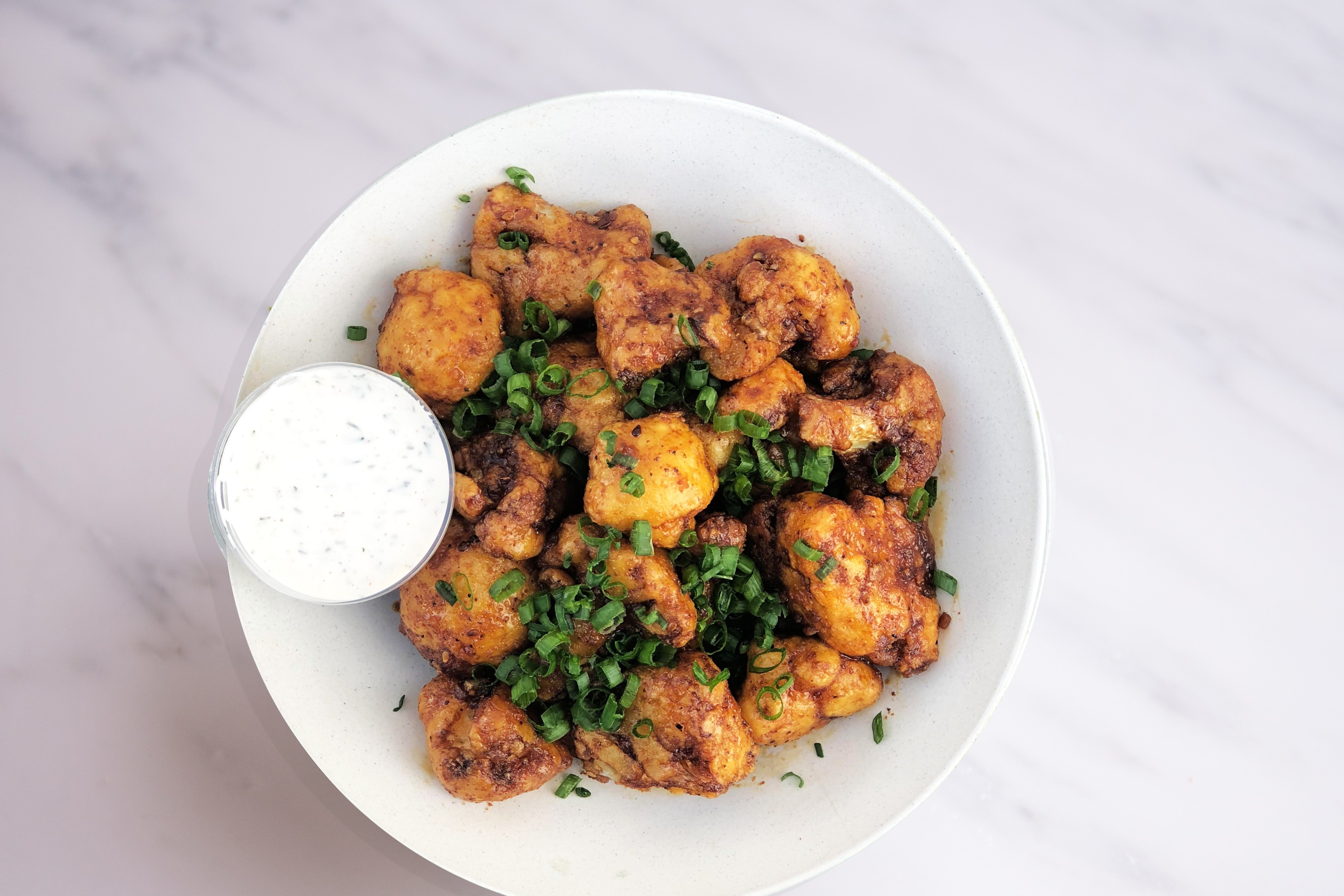 Order Peanut Butter Cauliflower Wings  food online from Ginger Bowls store, San Francisco on bringmethat.com