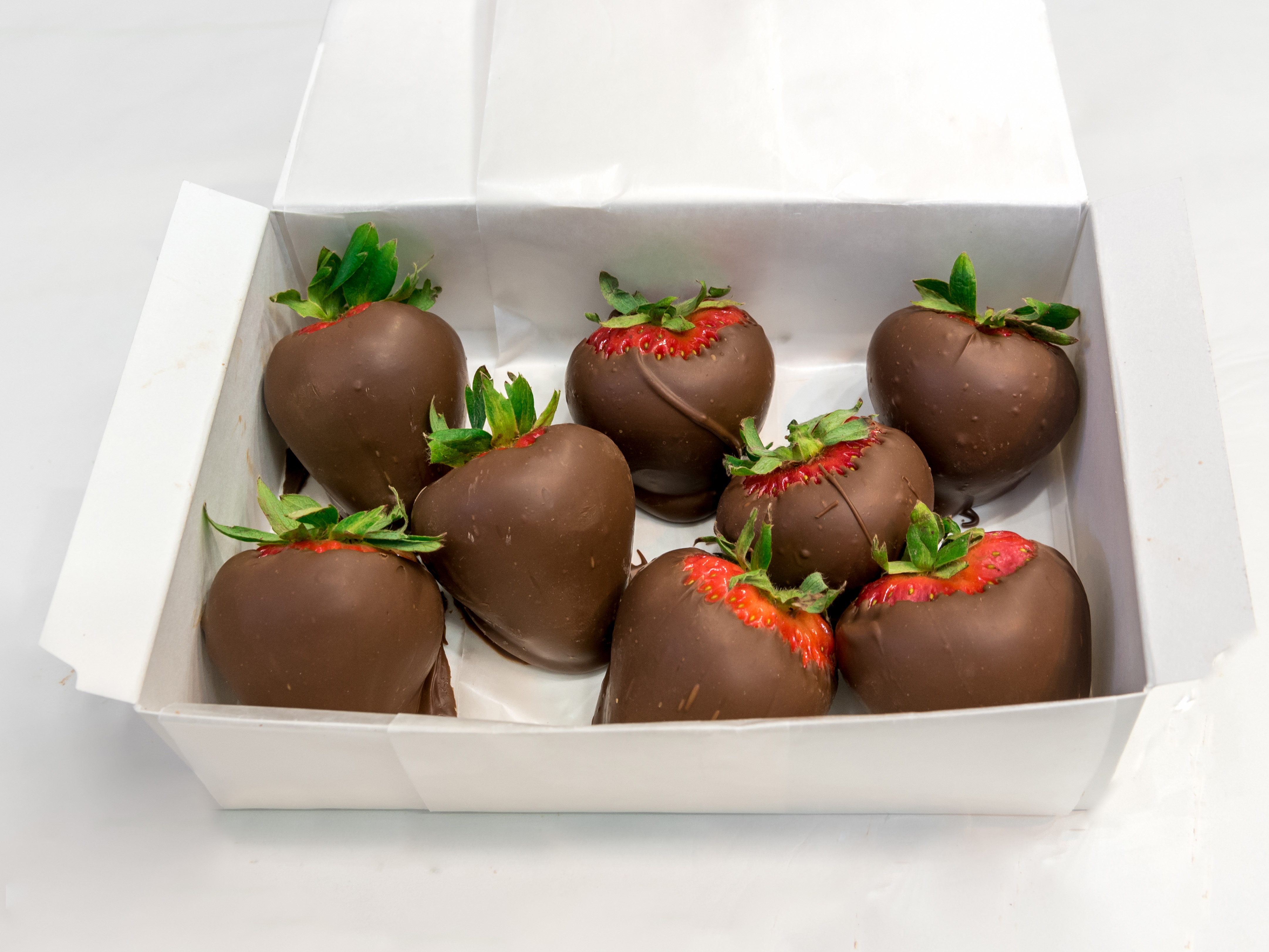 Order Milk Chocolate Covered Strawberries food online from The Fudge Pot store, Chicago on bringmethat.com