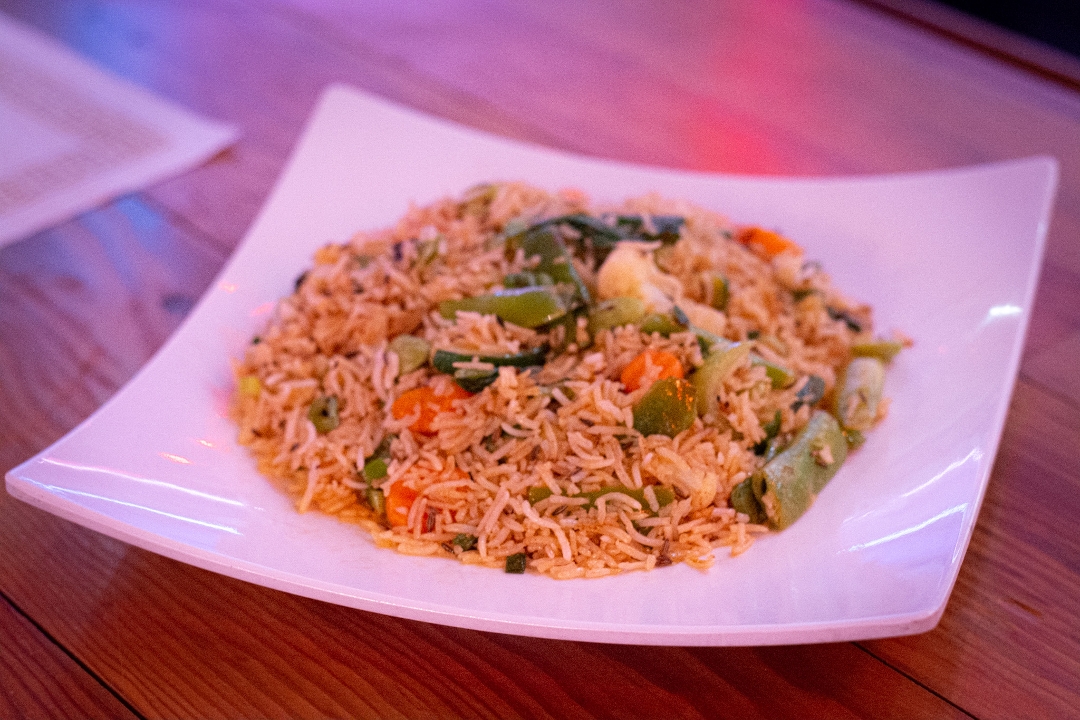 Order Jeera Vegetable Fried Rice food online from Yummefy Asian Restaurant store, Birmingham on bringmethat.com