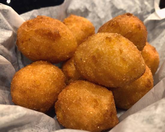 Order Hush Puppies (10 pcs) food online from Tasty Crab House store, Myrtle Beach on bringmethat.com