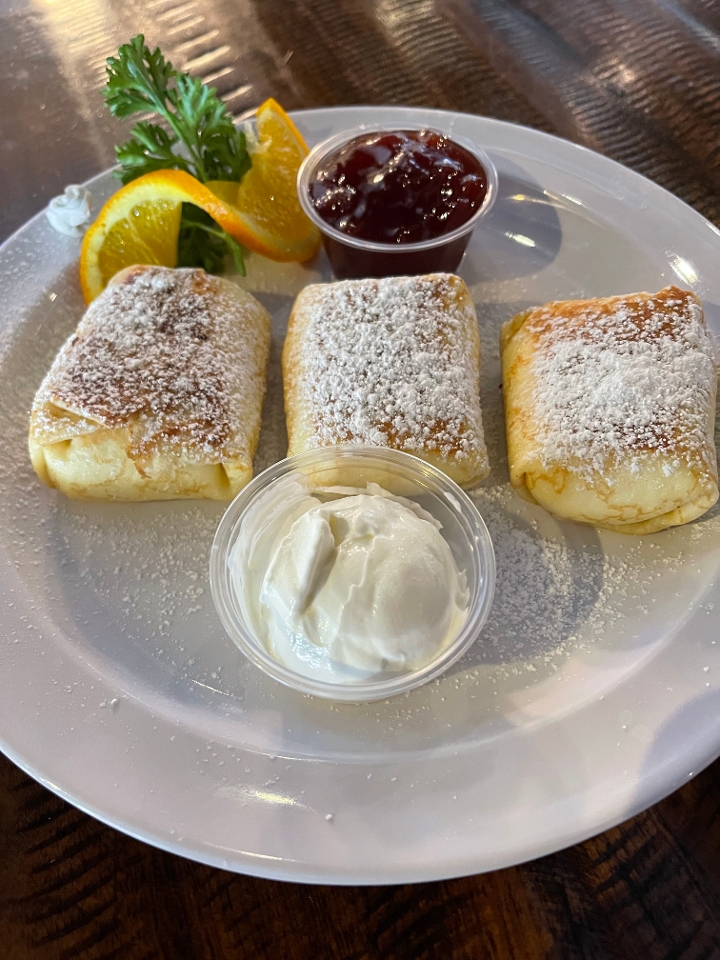 Order Cheese Blintz* food online from Old New York Deli & Bakery store, Camarillo on bringmethat.com