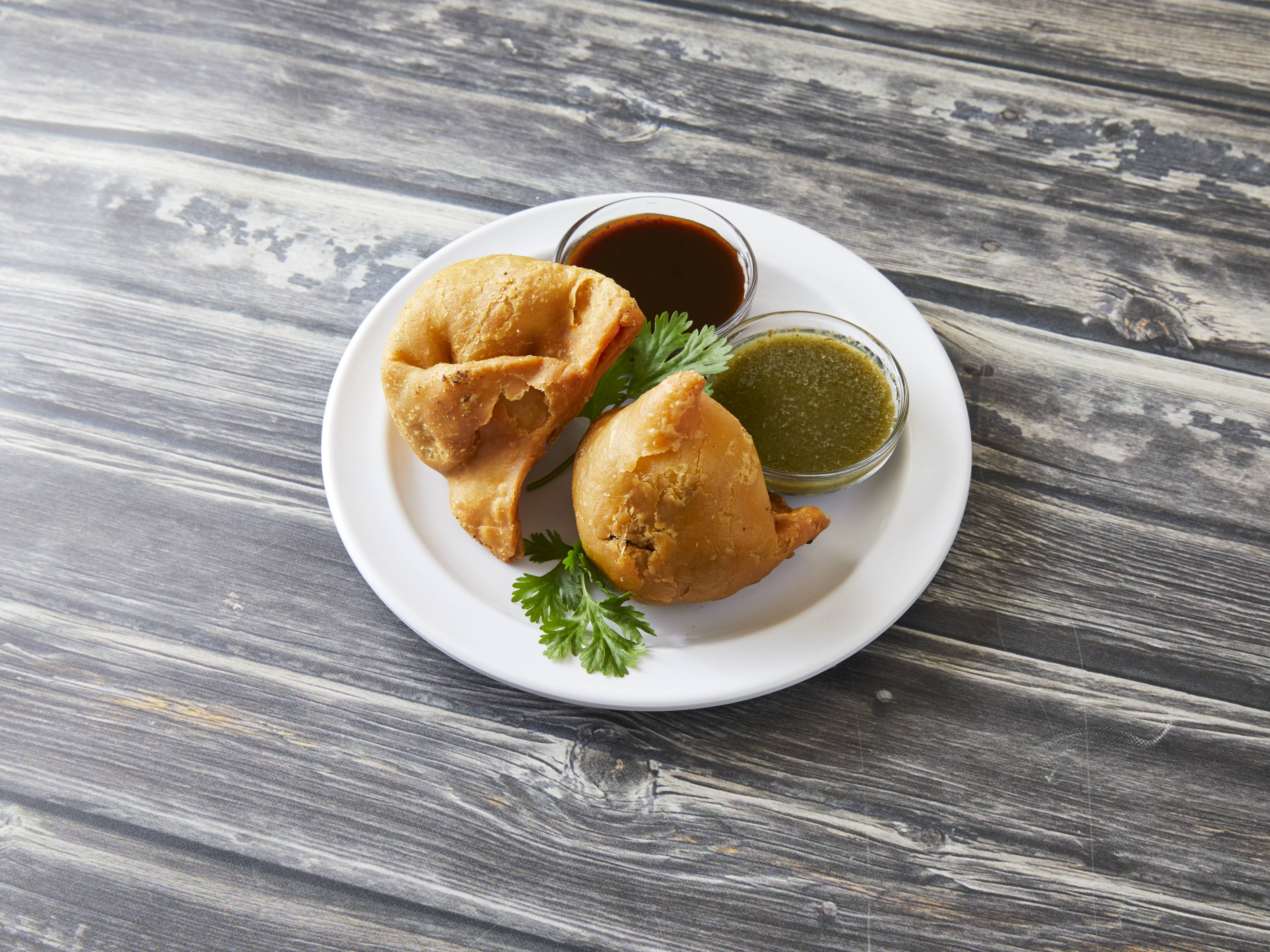 Order Vegetable Samosa food online from Indian Cuisine store, Portage on bringmethat.com