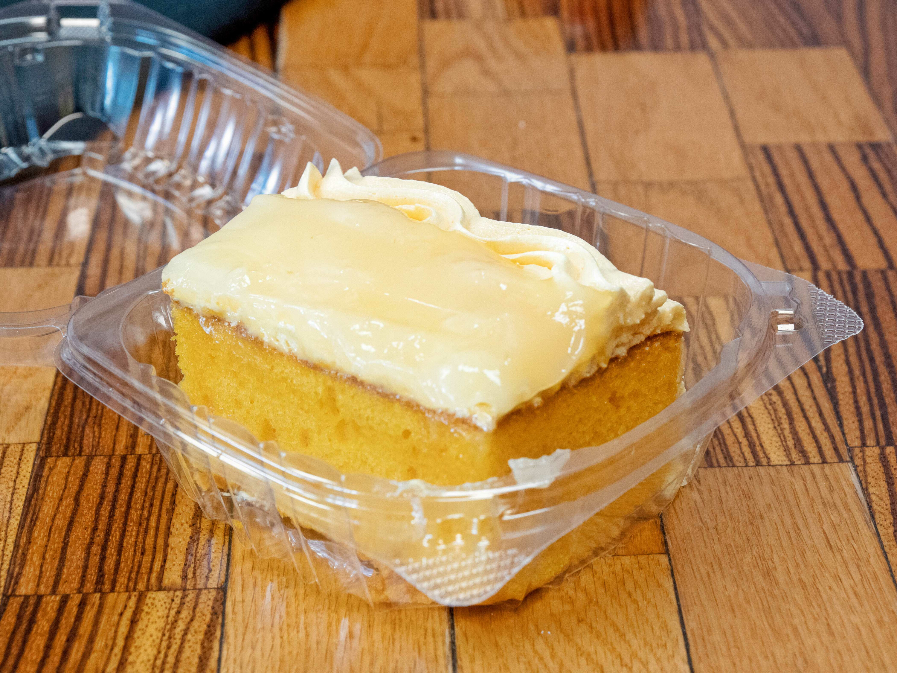 Order Lemon sunshine cake food online from District Fish & Pasta House store, Kansas City on bringmethat.com