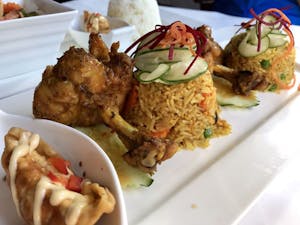 Order Pineapple Fried Rice with Chicken Lollipop  food online from Mint Leaf Cuisine store, Saratoga on bringmethat.com