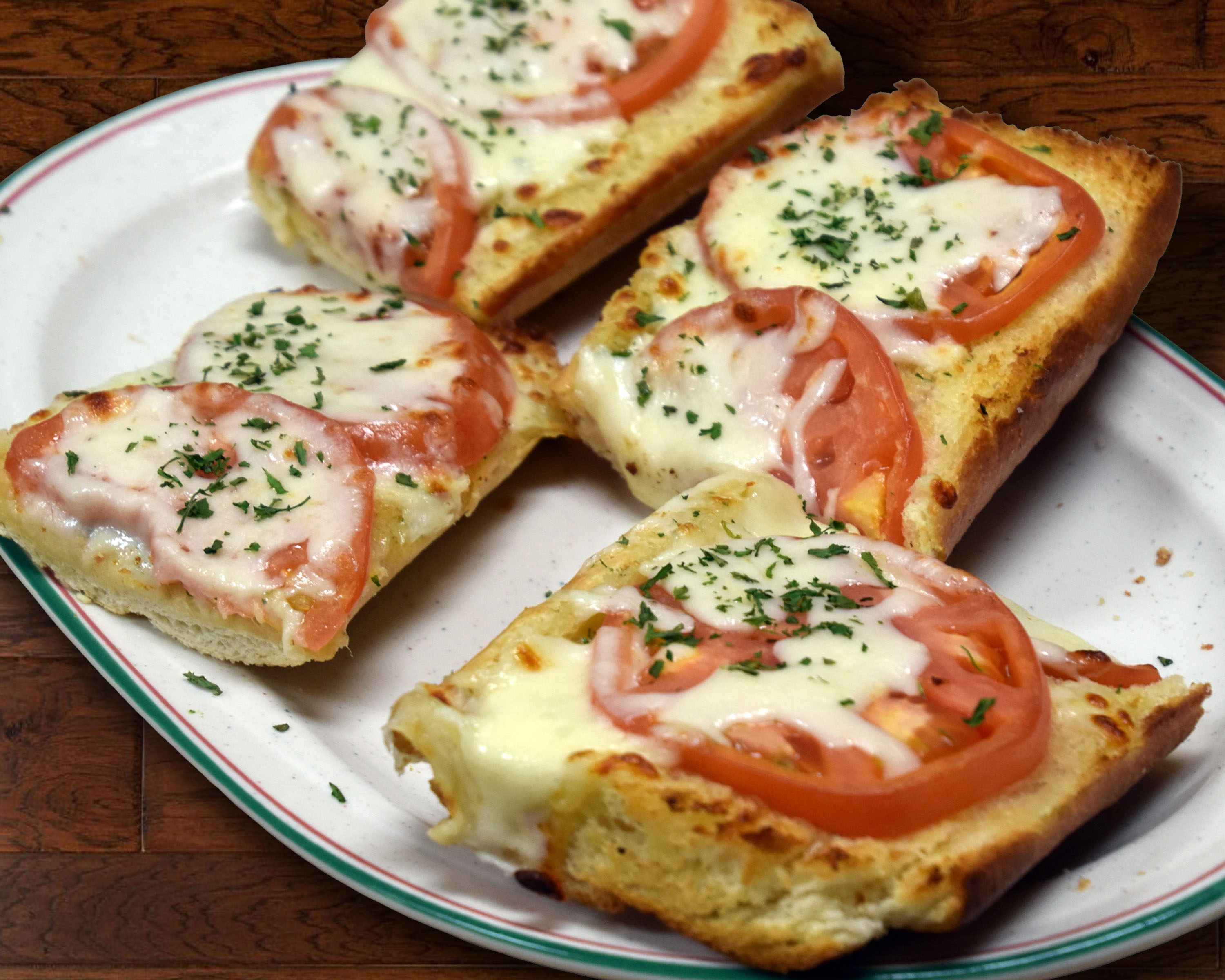 Order Tomato Bread food online from Beggars Pizza store, Blue Island on bringmethat.com