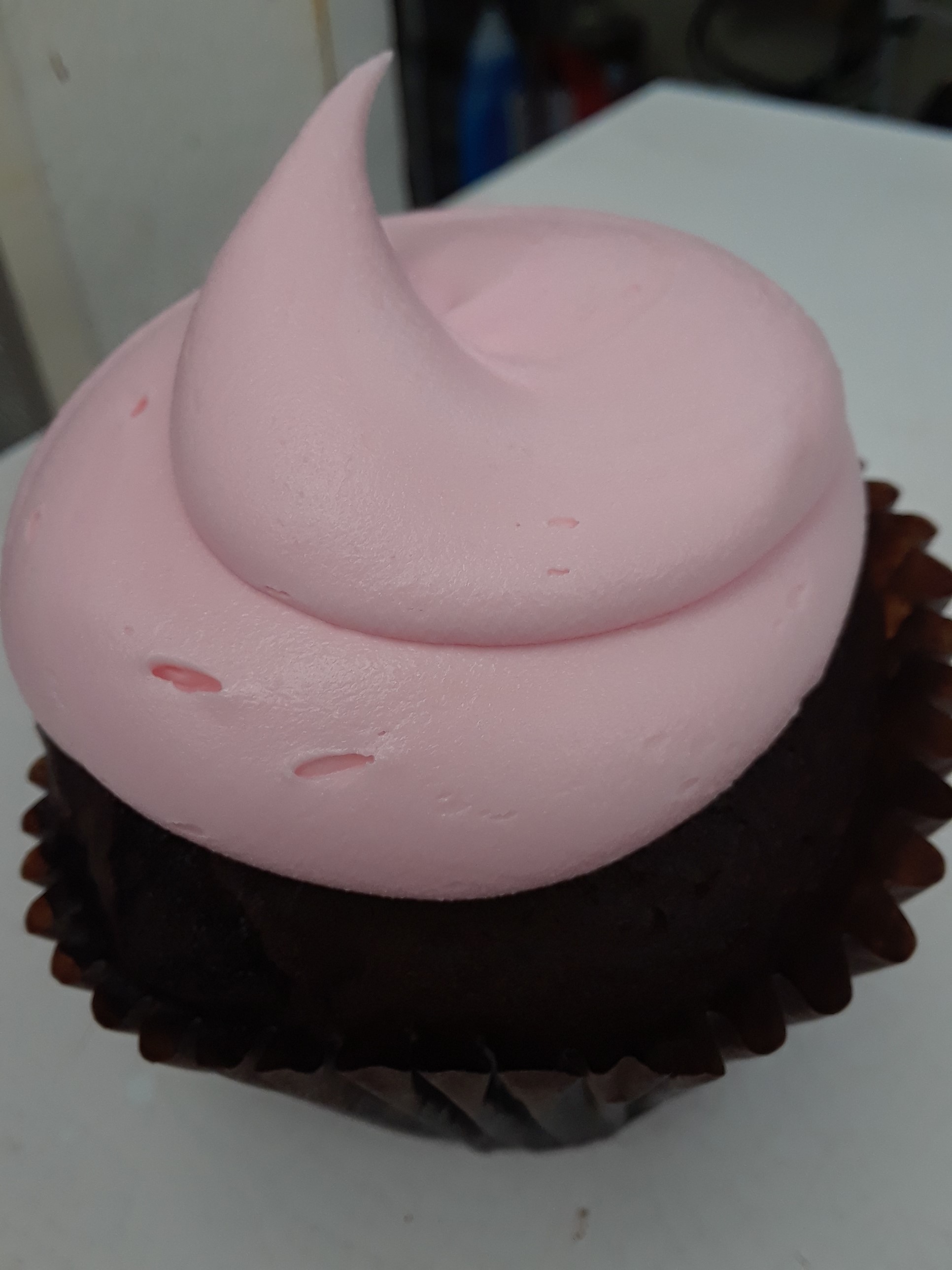 Order Pink Chocolate Cupcake food online from Smallcakes Cupcakery And Creamery store, Naperville on bringmethat.com