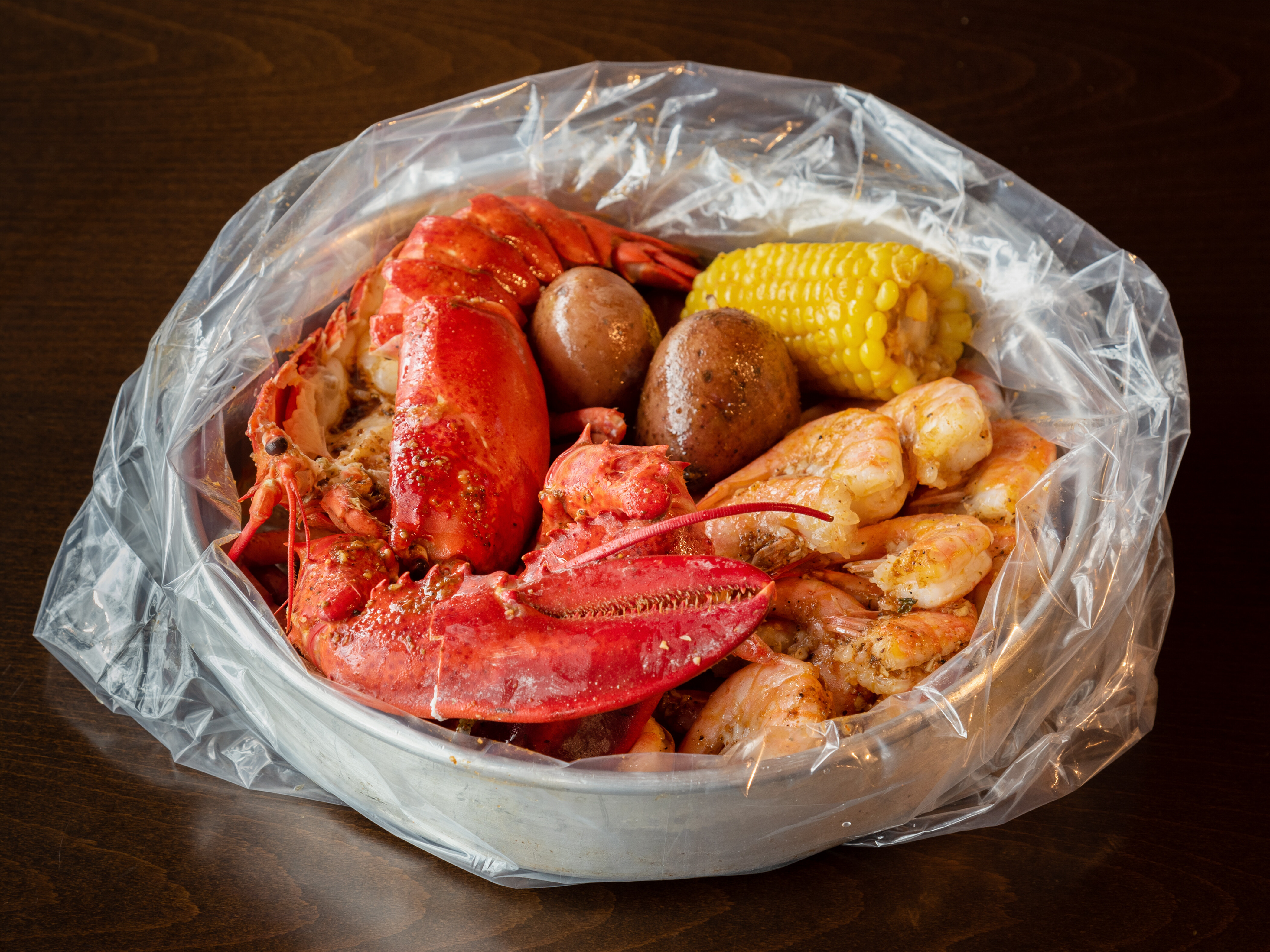 Order 8. Lobster and Shrimp with No Head Combo food online from Shaking Seafood store, Roslindale on bringmethat.com