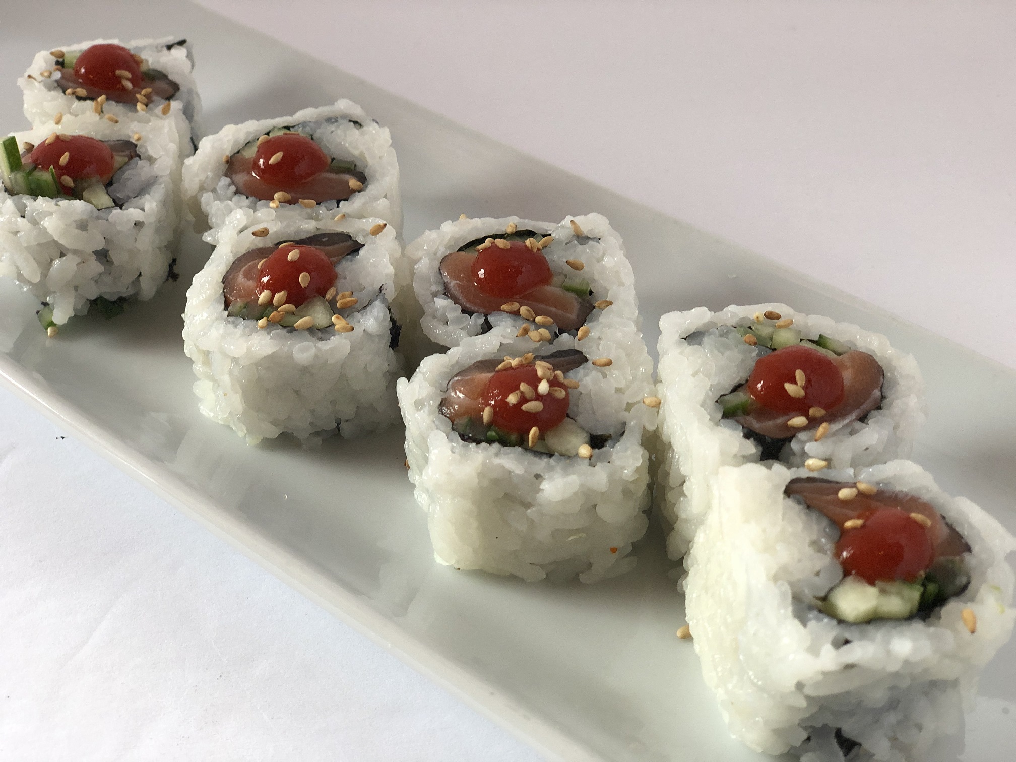 Order Spicy Salmon Roll food online from Sushi Spott store, Mill Creek on bringmethat.com
