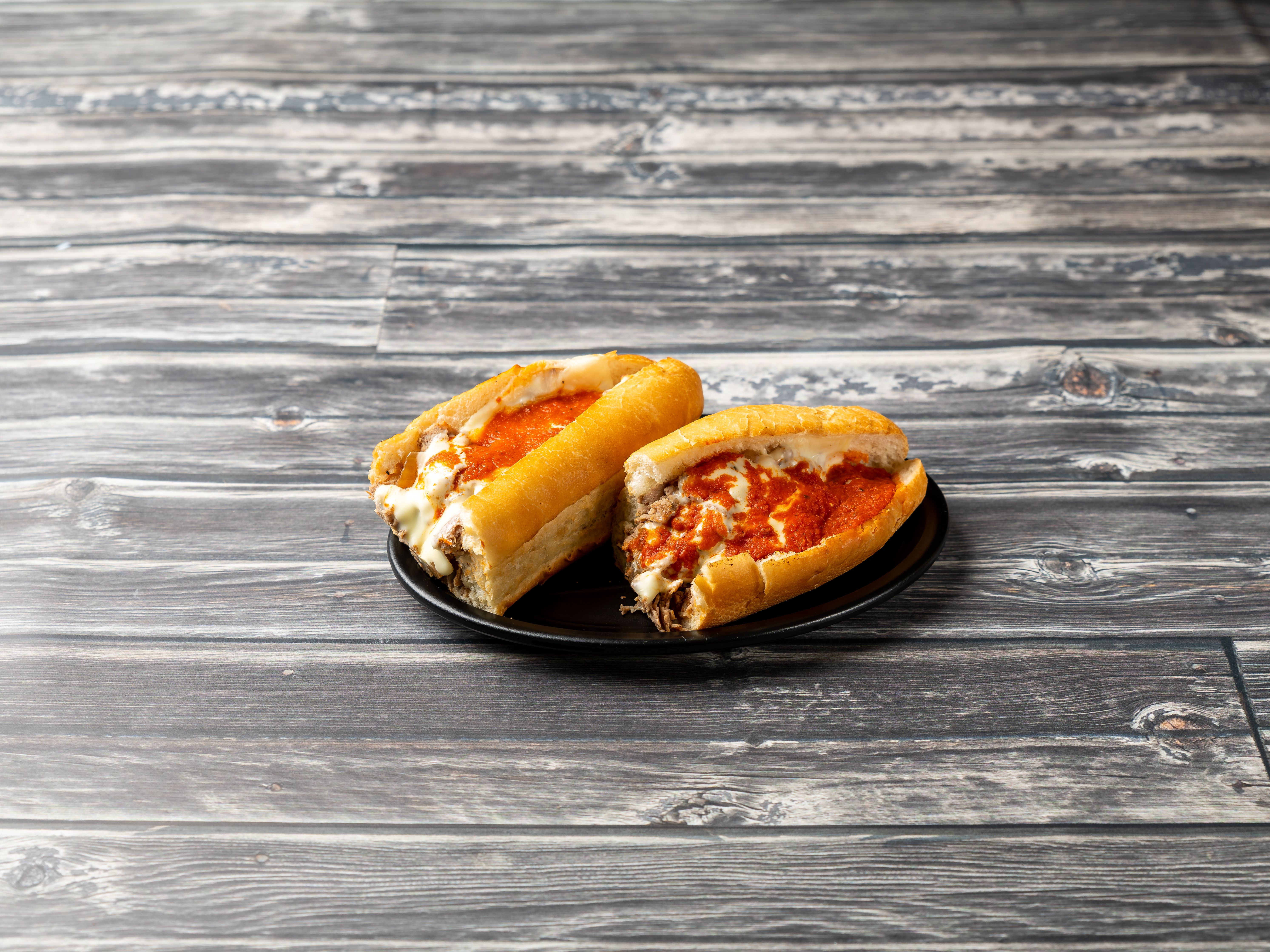 Order Cheesesteak with Onion and Sauce food online from Italy's Restaurant and Pizzeria store, Phillipsburg on bringmethat.com