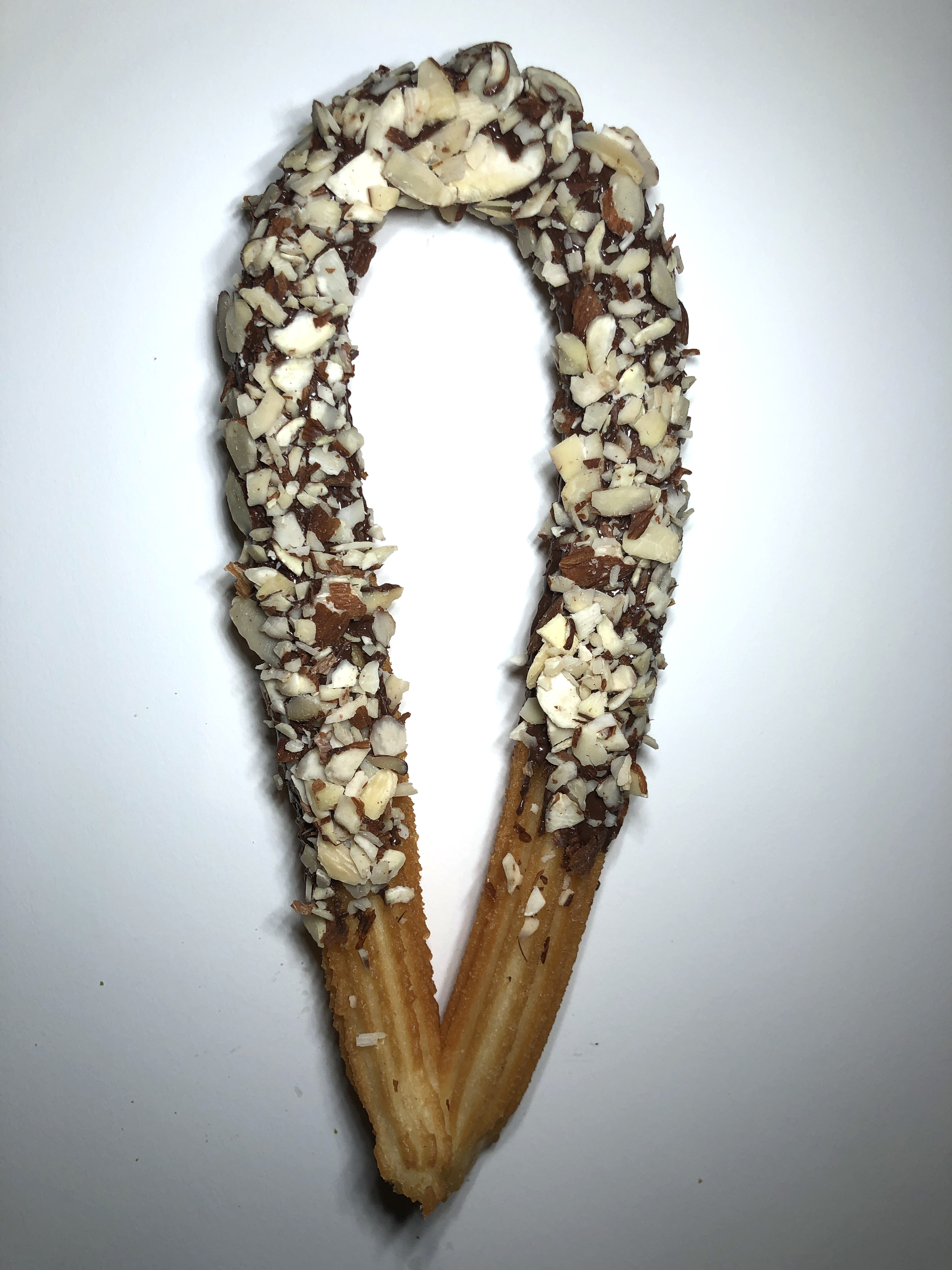Order Churro with Chocolate and Almond food online from Sweet Churros store, New York on bringmethat.com