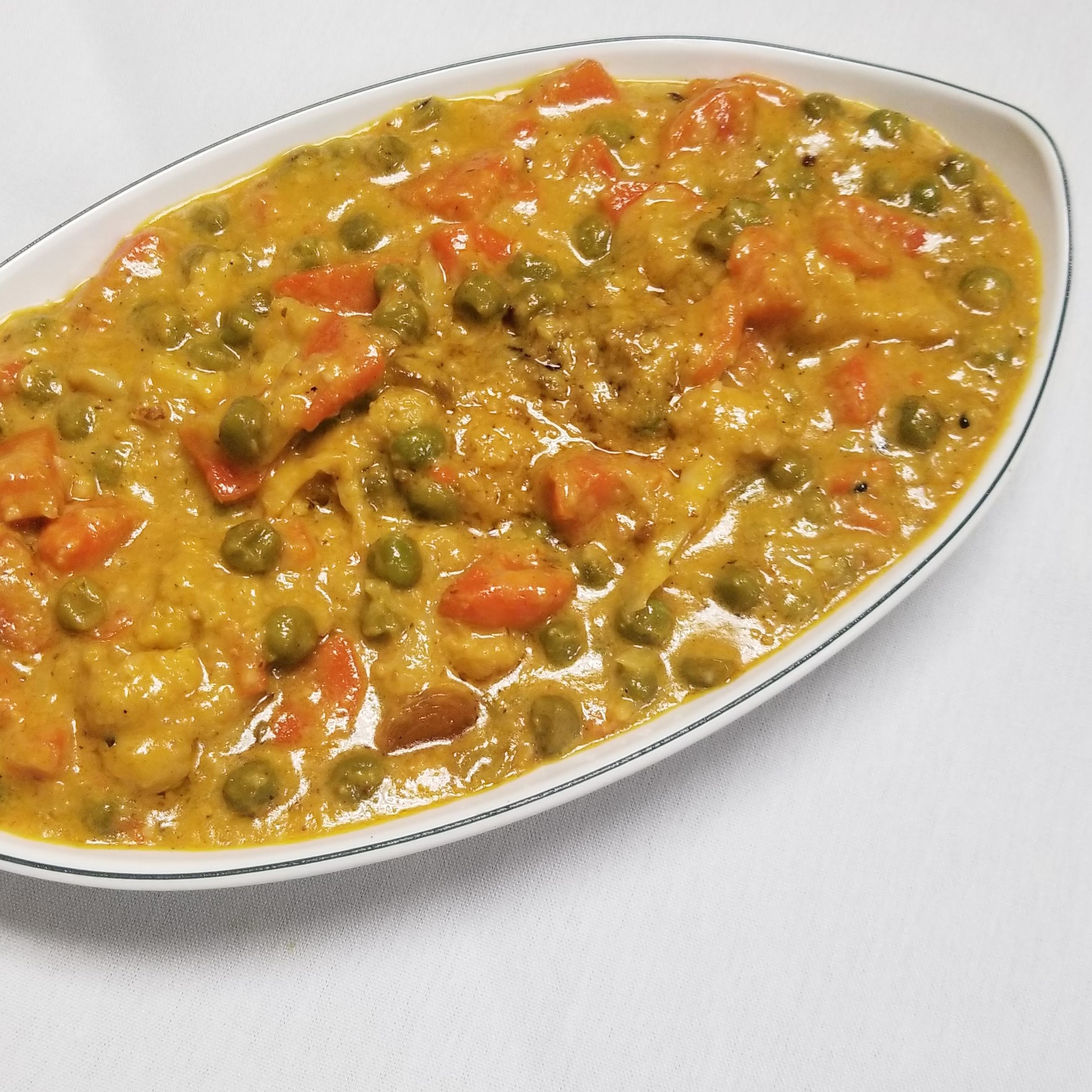Order Veggie Kurma Dinner food online from The indian kitchen store, West Hollywood on bringmethat.com