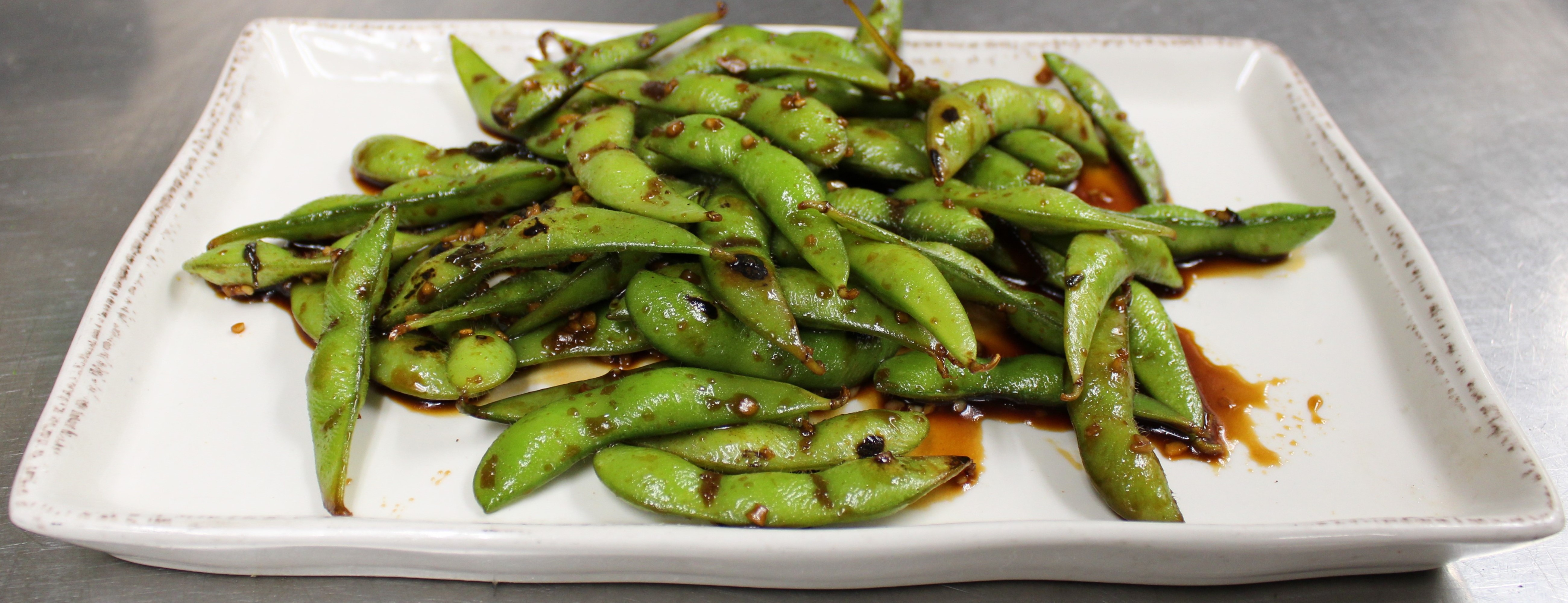 Order Edamame food online from High Park Tap House store, Mission Viejo on bringmethat.com