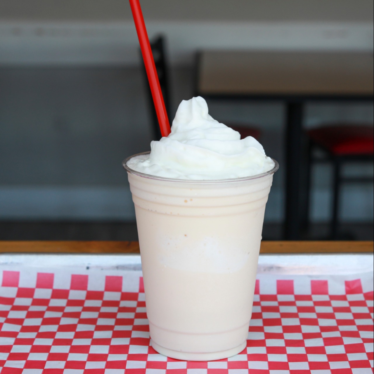 Order Vanilla Milkshake food online from Biggie Burgers store, San Diego on bringmethat.com