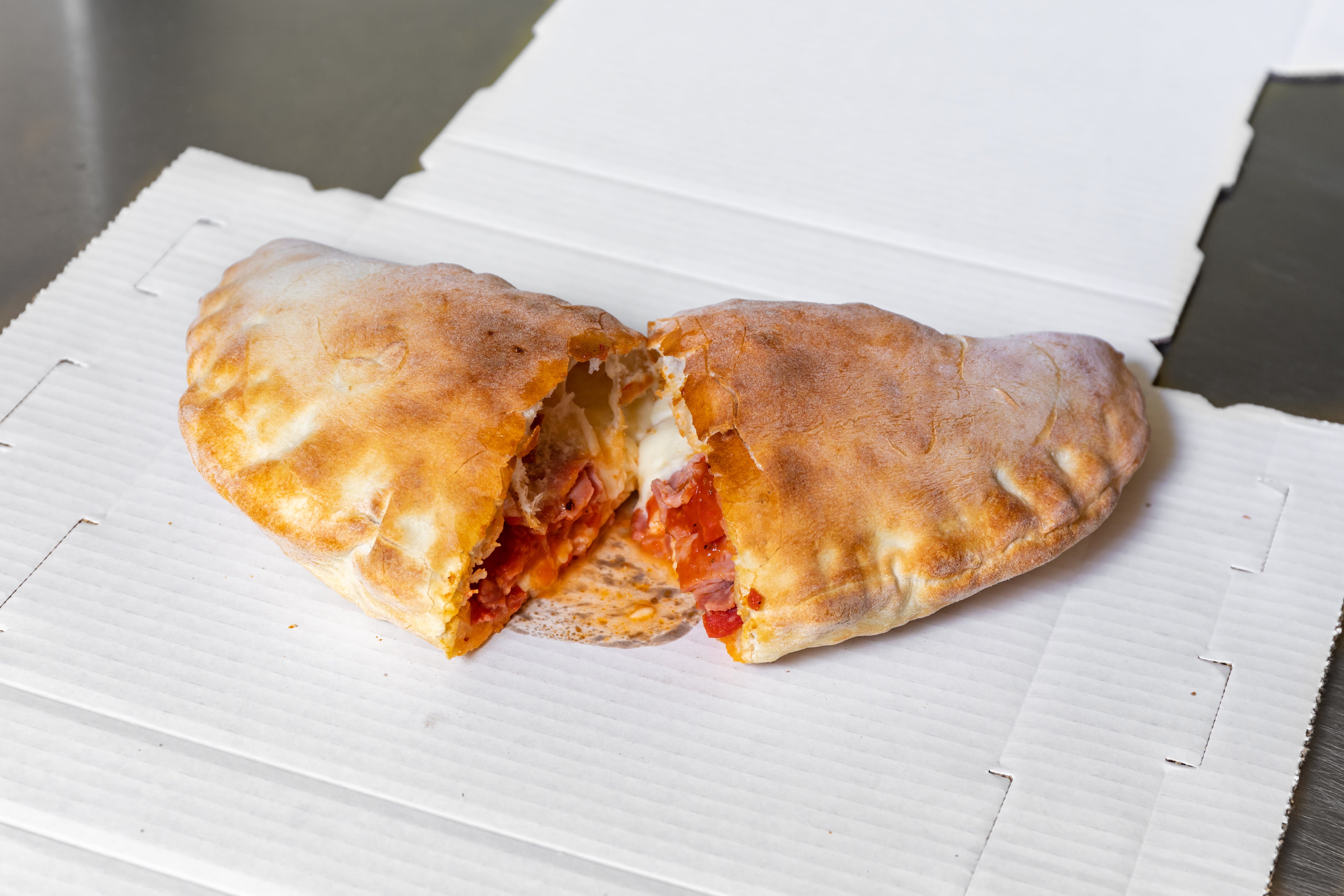 Order Calzone - Small food online from Fratelli Pizza Cafe store, Edison on bringmethat.com