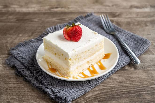 Order Tres Leches Cake food online from On The Border Mexican Grill store, Colorado Springs on bringmethat.com