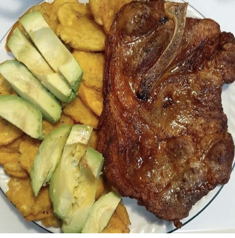 Order Pork chop whit tostones and avocado food online from Youndys Hispanic Sweets And Kitchen store, Bloomingdale on bringmethat.com