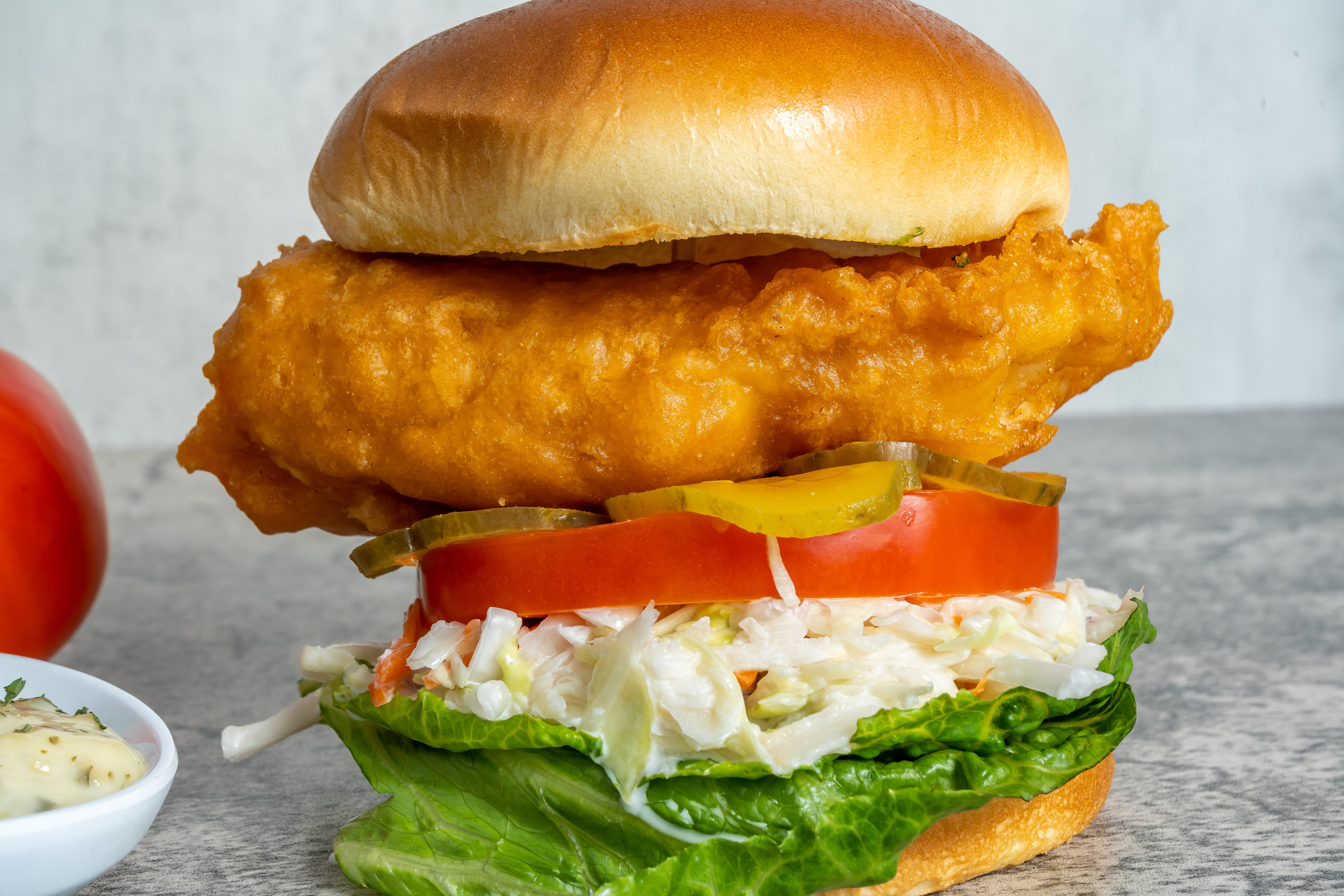 Order Fish Sandwich - Sandwich food online from Captain's Table store, Greensboro on bringmethat.com