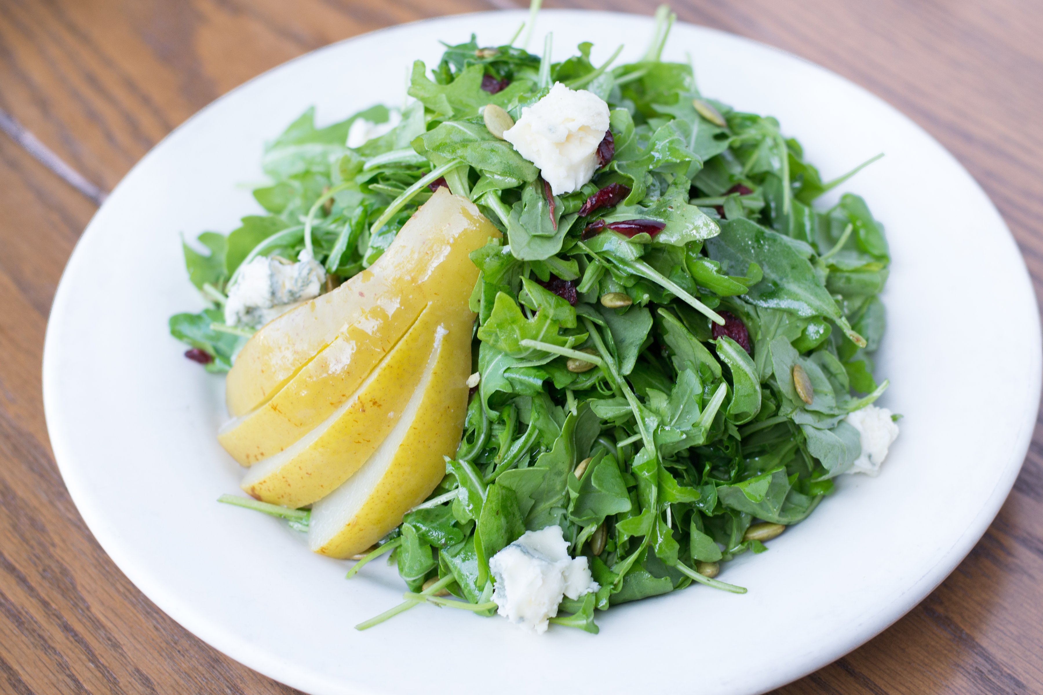 Order Poached Pear Salad food online from Al Forno Caffe store, Costa Mesa on bringmethat.com