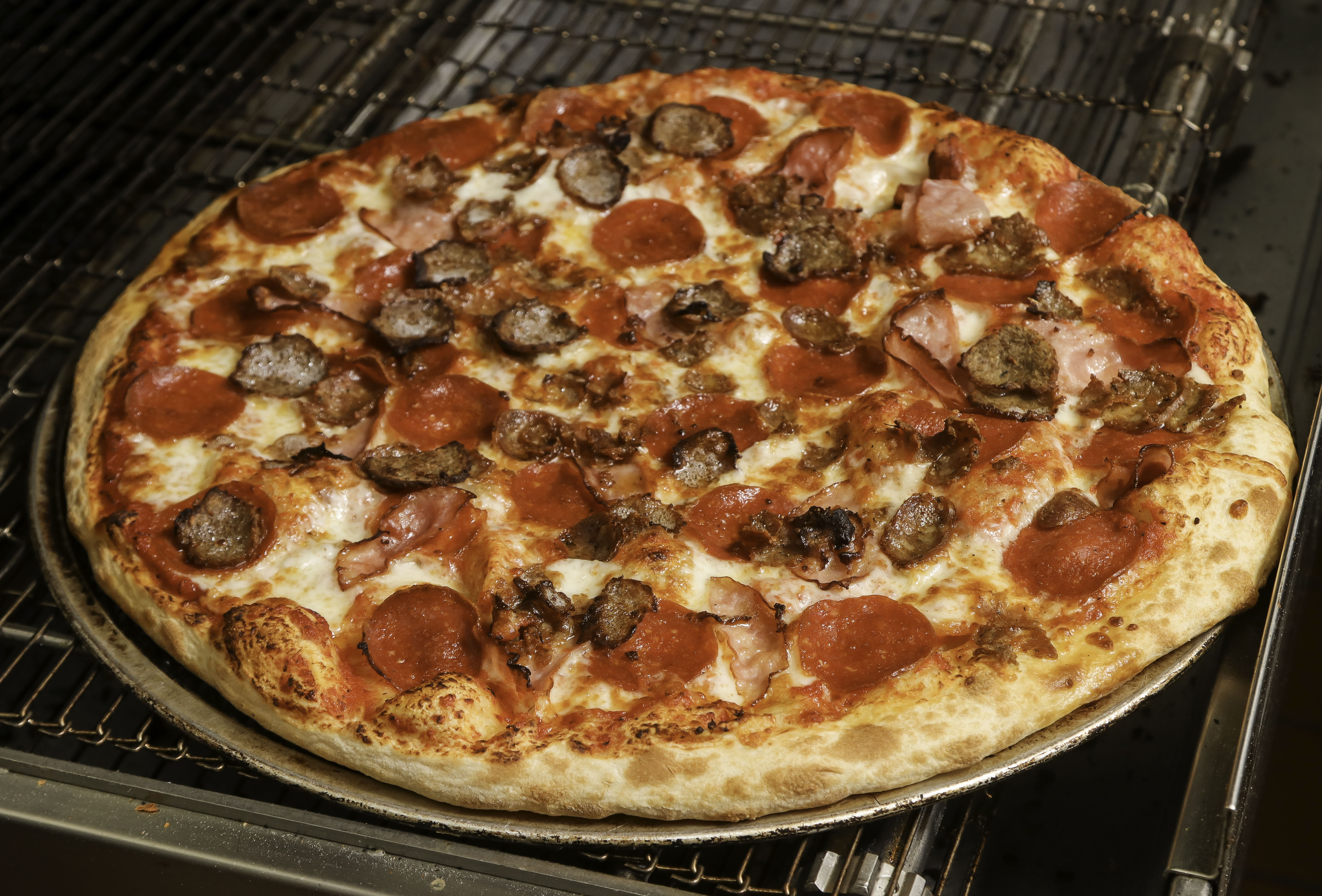 Order Meat Eater Pizza food online from Ameci Pizza & Pasta - Lake Forest store, Lake Forest on bringmethat.com