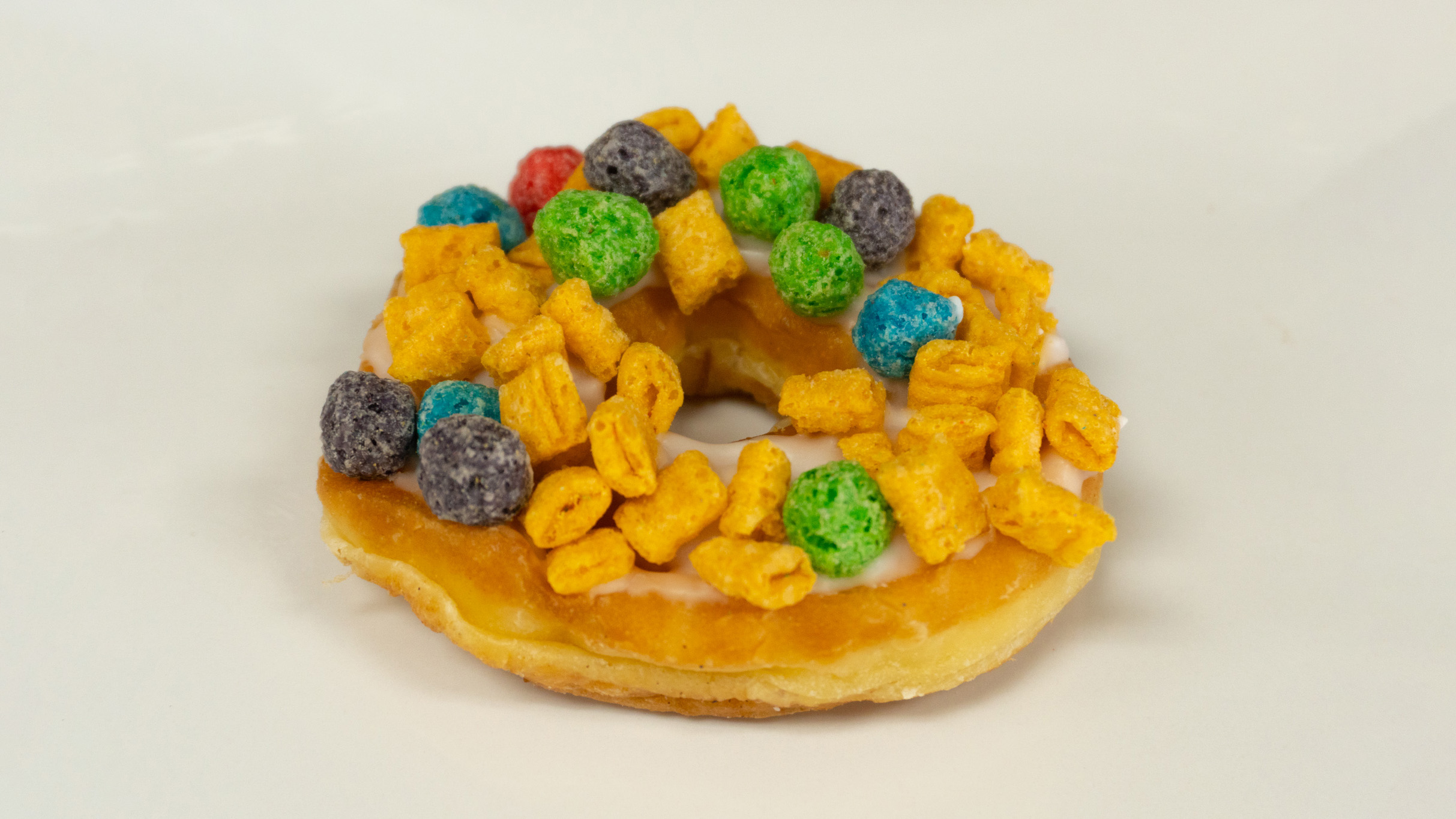 Order Specialty Cereal Donut food online from Rainbow Donuts store, Norwalk on bringmethat.com