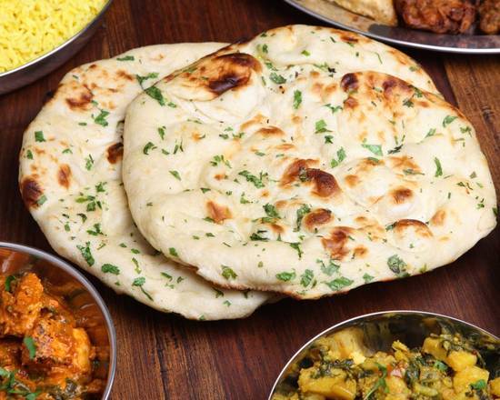 Order Cheese Naan food online from Aroma Indian Restaurant store, Bloomington on bringmethat.com