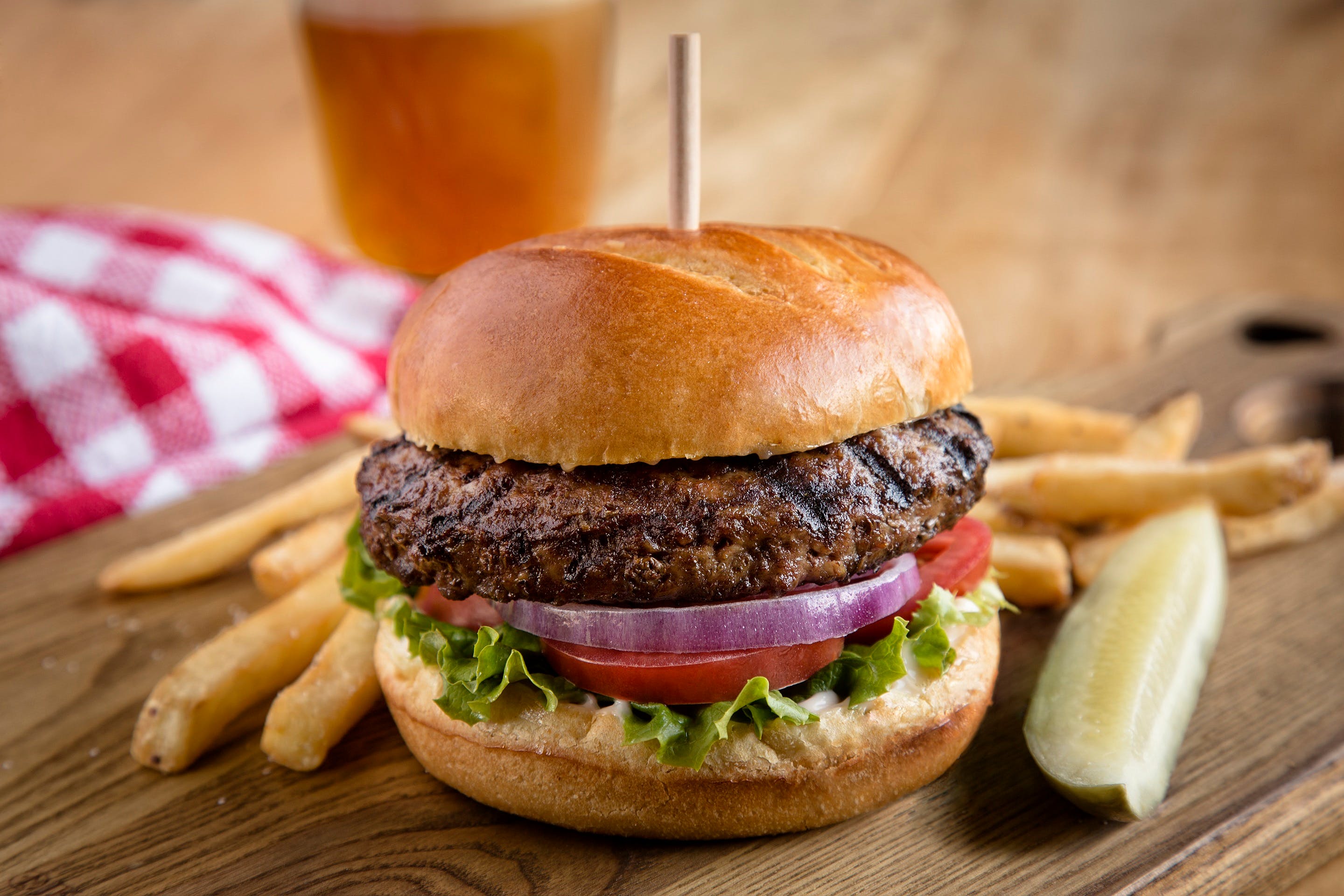 Order The Uno Burger - 1/2 lb. food online from Uno Pizzeria & Grill store, Birch Run on bringmethat.com