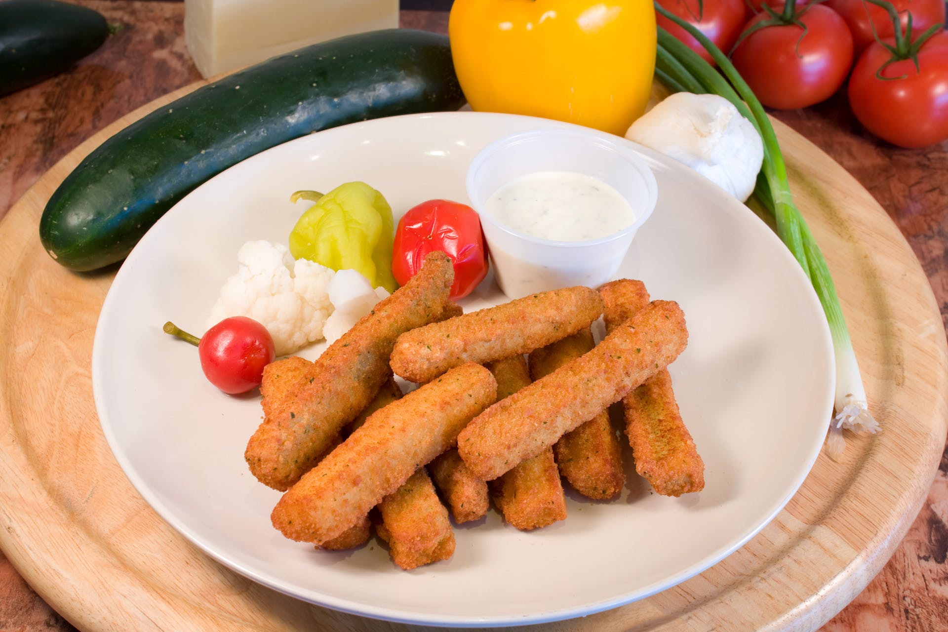 Order Zucchini Sticks - 10 Pieces food online from Ameci Pizza & Pasta store, Canyon Country on bringmethat.com
