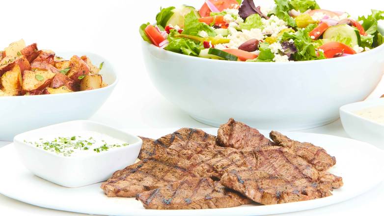 Order Grilled Lamb Family Feast for 6 food online from Taziki Mediterranean Cafe store, Memphis on bringmethat.com