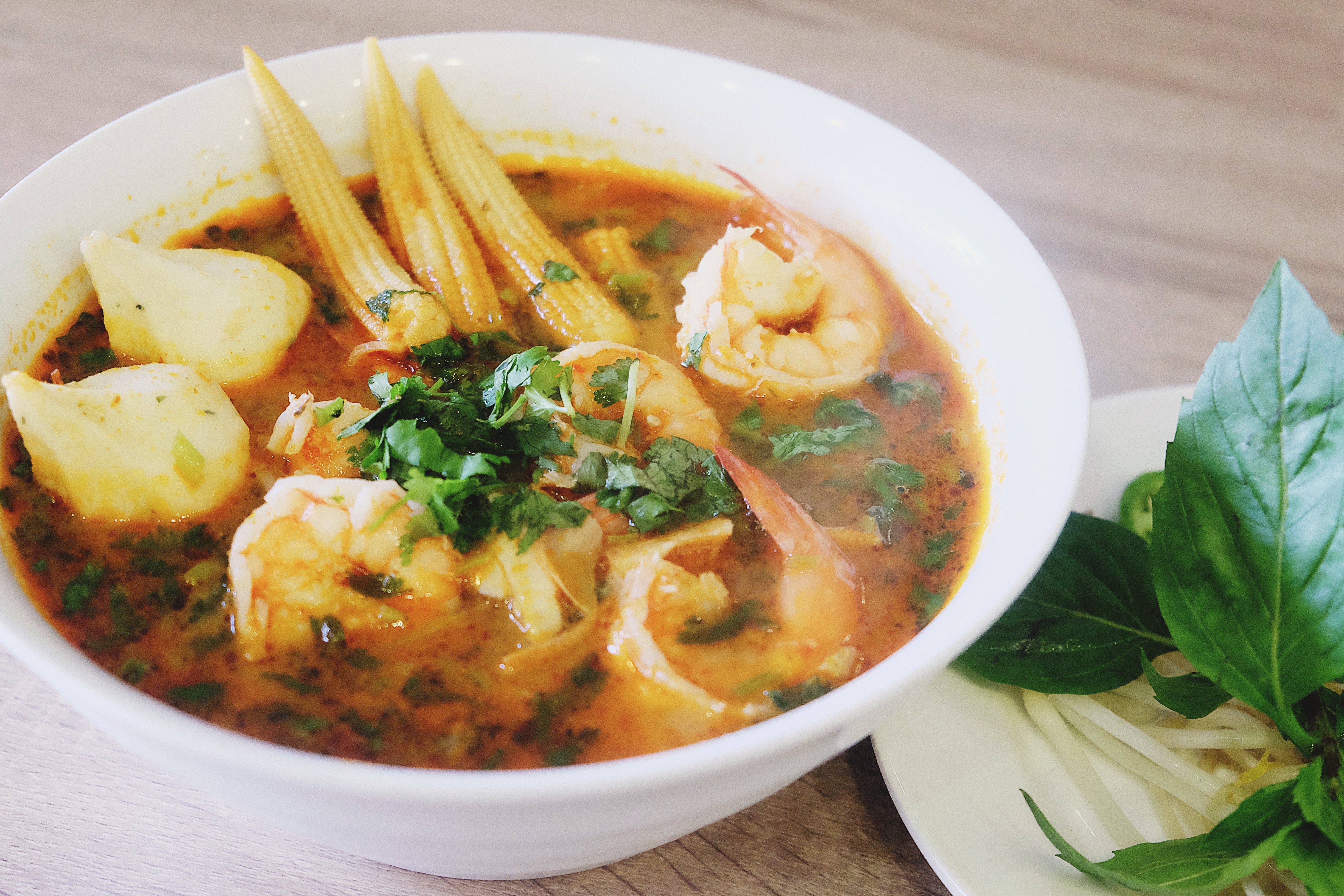 Order P7. Tomyum Seafood Pho food online from Pho Cravin store, Fremont on bringmethat.com