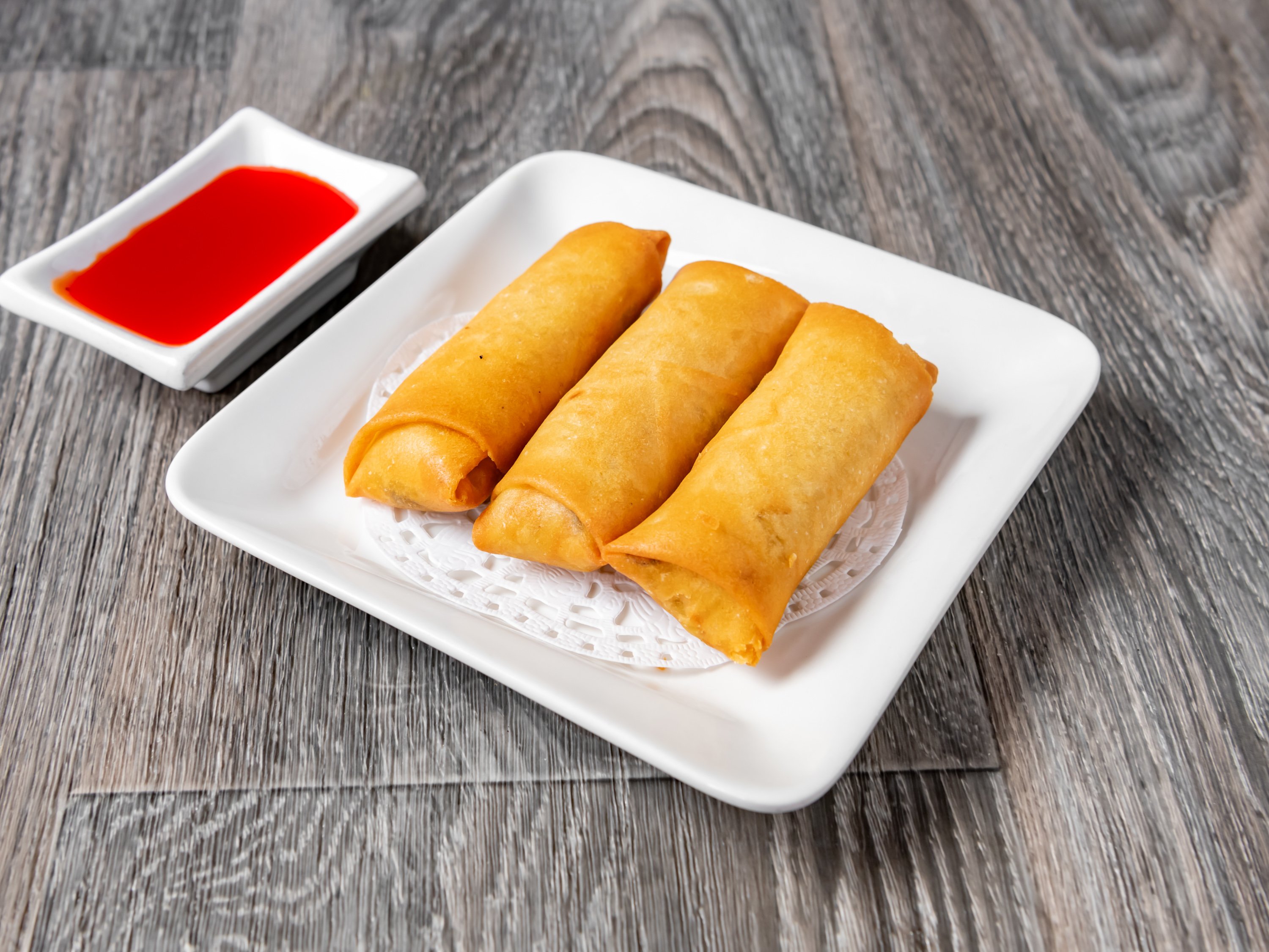 Order 3 Vegetarian Egg Rolls with Meatless Chicken food online from Big lantern chinese store, San Francisco on bringmethat.com