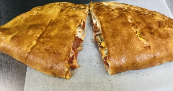 Order cheeseteak stromboli(steak,green peppers,onions,marinara sauce & mozzarella cheese) food online from A-1 Deli And Fried Chicken store, Wilmington on bringmethat.com