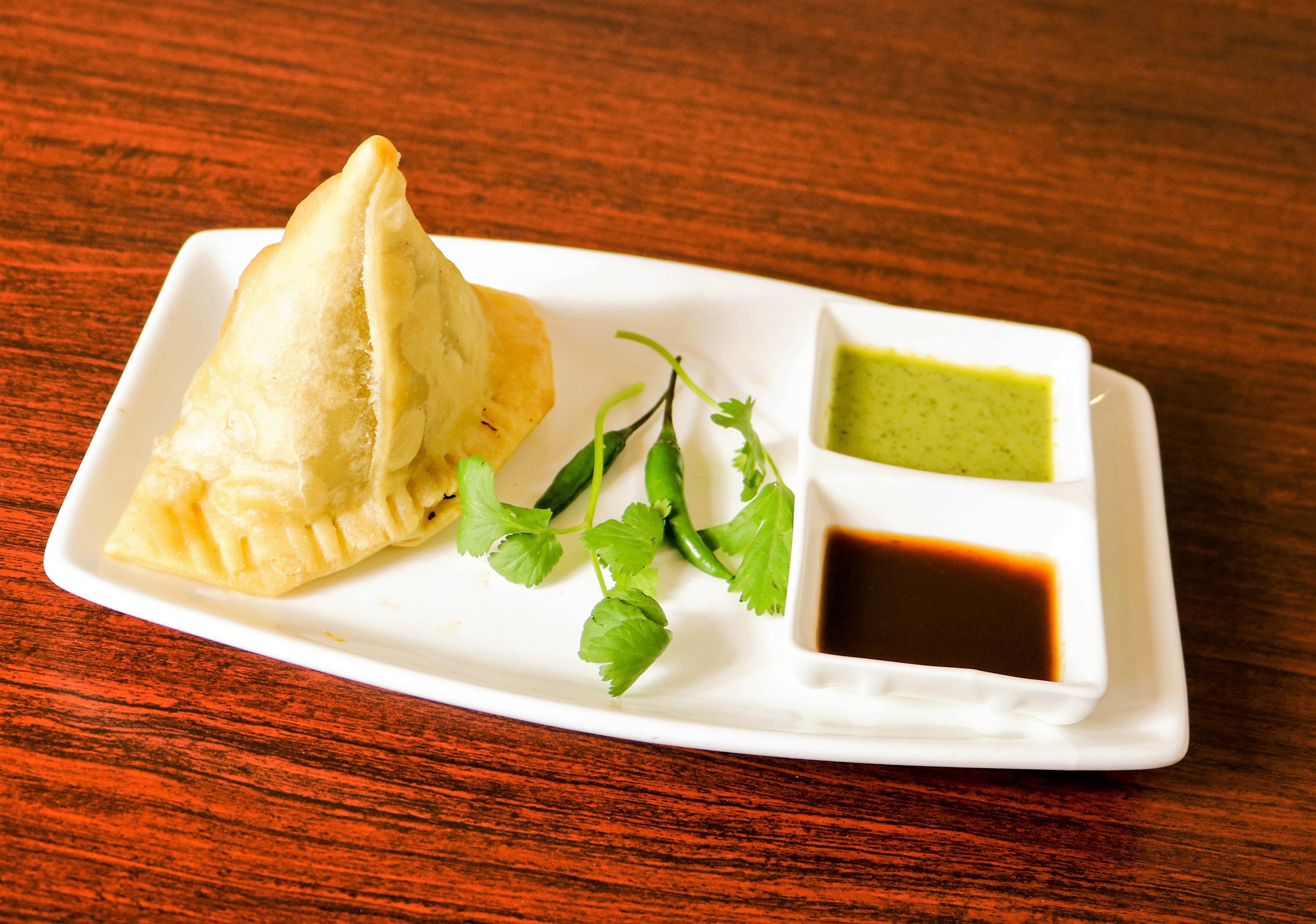 Order Chicken Samosa (2 pieces) food online from Taste of bengal store, Astoria on bringmethat.com