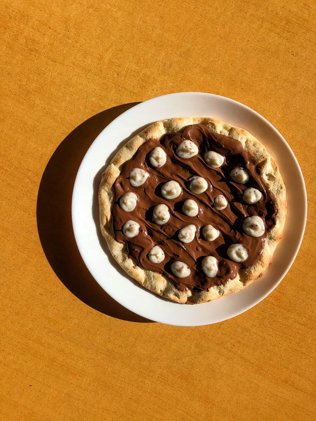 Order Nutella & Cannoli Cream Pizza - 6" food online from Nunzios Kitchen store, Sayreville on bringmethat.com