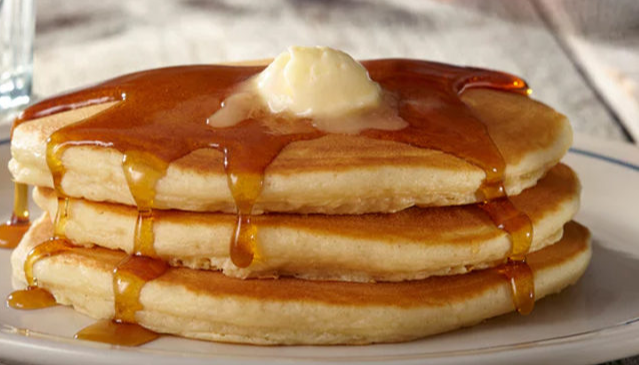 Order Three Buttermilk Pancakes food online from Janik's Cafe store, Chicago on bringmethat.com