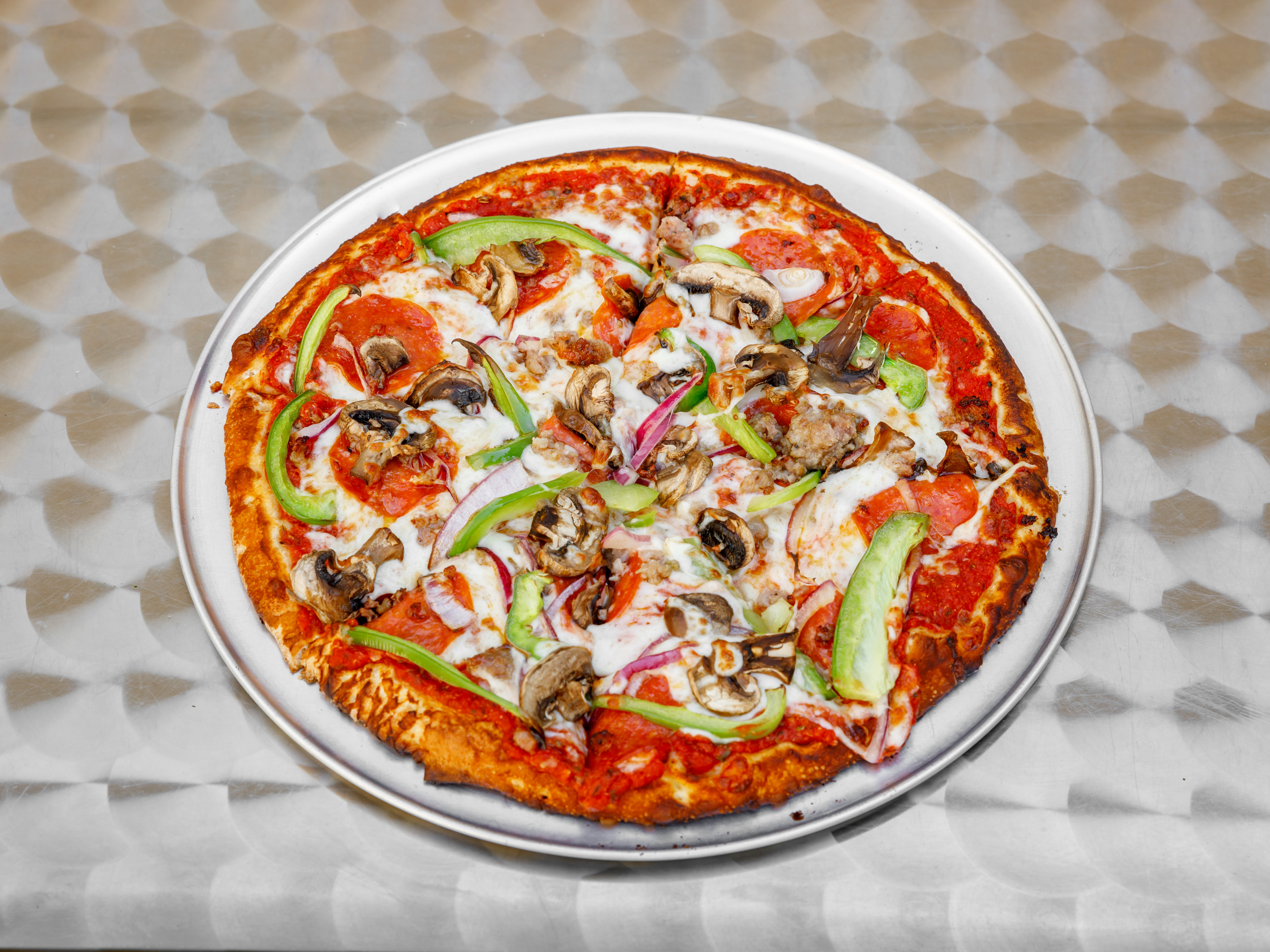 Order Deluxe Pizza food online from Fyre Pizza store, Bellflower on bringmethat.com