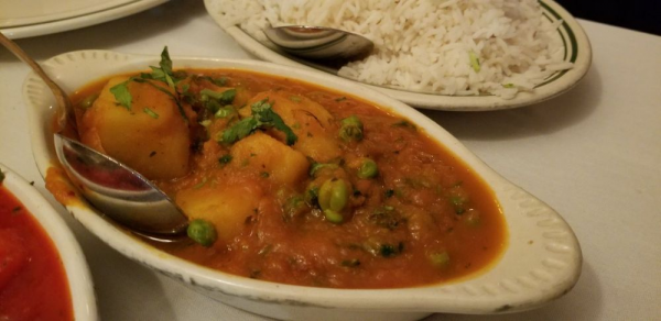 Order Aloo Matar food online from India's Restaurant store, Los Angeles on bringmethat.com