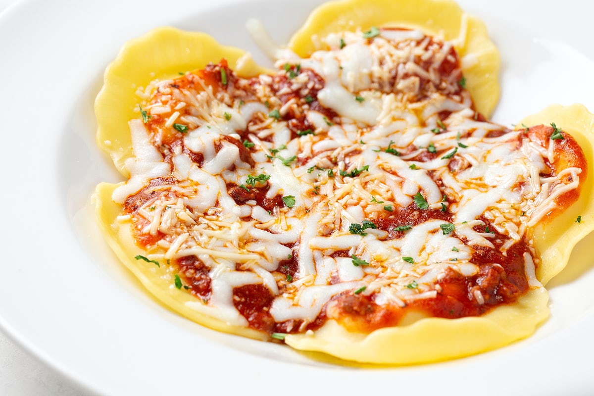 Order CLASSIC CHEESE RAVIOLI food online from Johnny Carino's store, El Centro on bringmethat.com