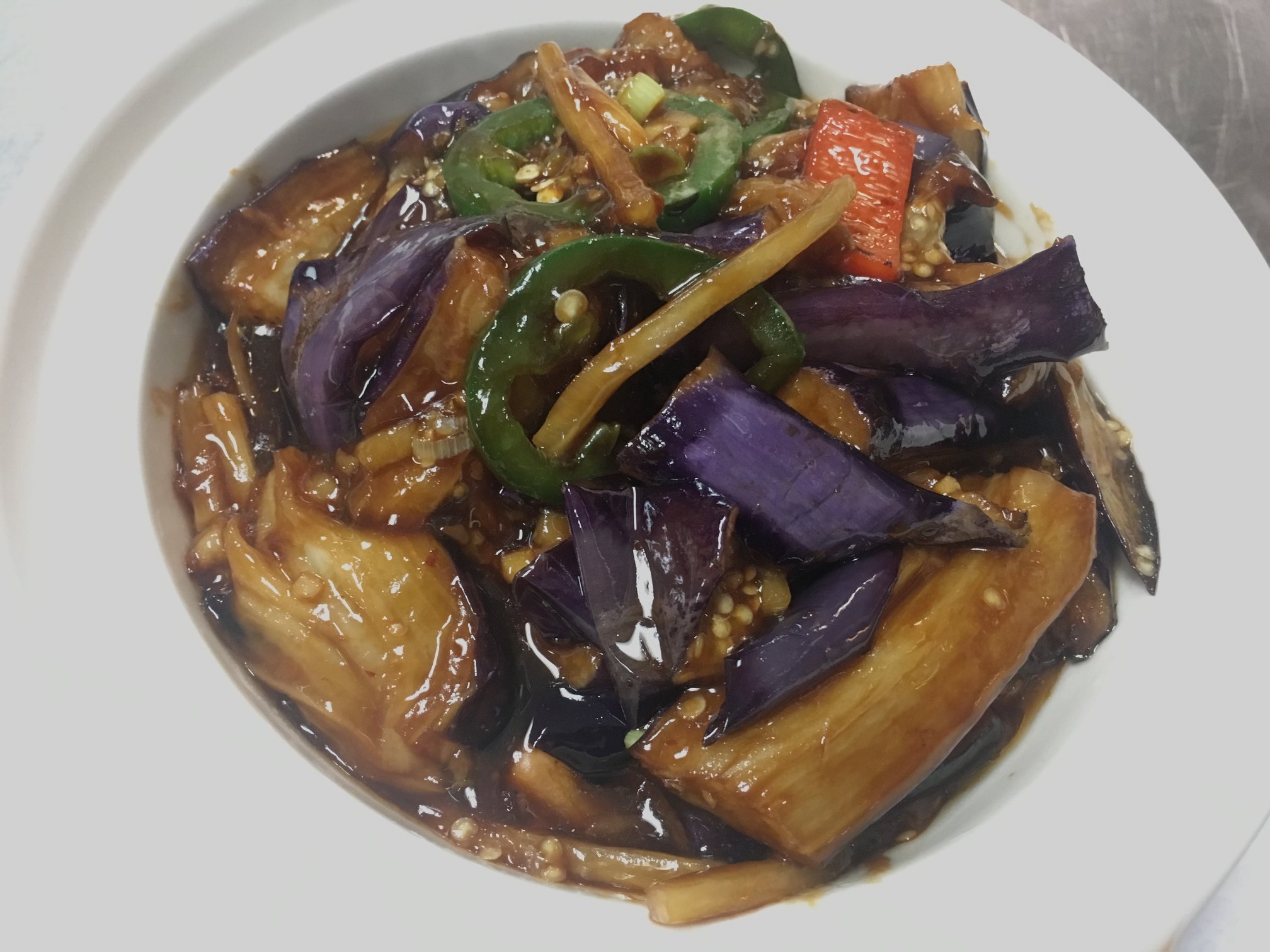 Order V1. Spicy Eggplant food online from Cafe Abdullah store, Sugar Land on bringmethat.com