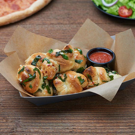 Order Garlic Knots - 3 Pieces food online from Flippin Pizza - Maryland Ave store, Washington on bringmethat.com
