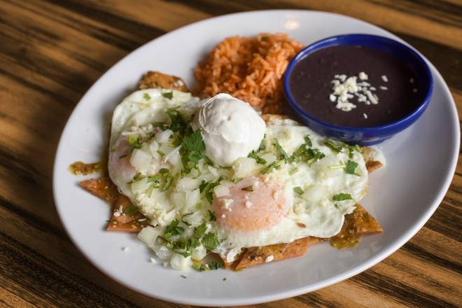 Order Chilaquiles* (V, GF) food online from Kerbey Lane Cafe store, Austin on bringmethat.com