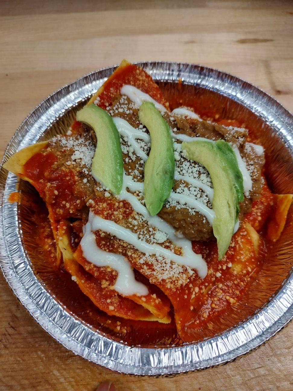 Order Chilaquiles food online from Carlos Que Pasa store, Toledo on bringmethat.com