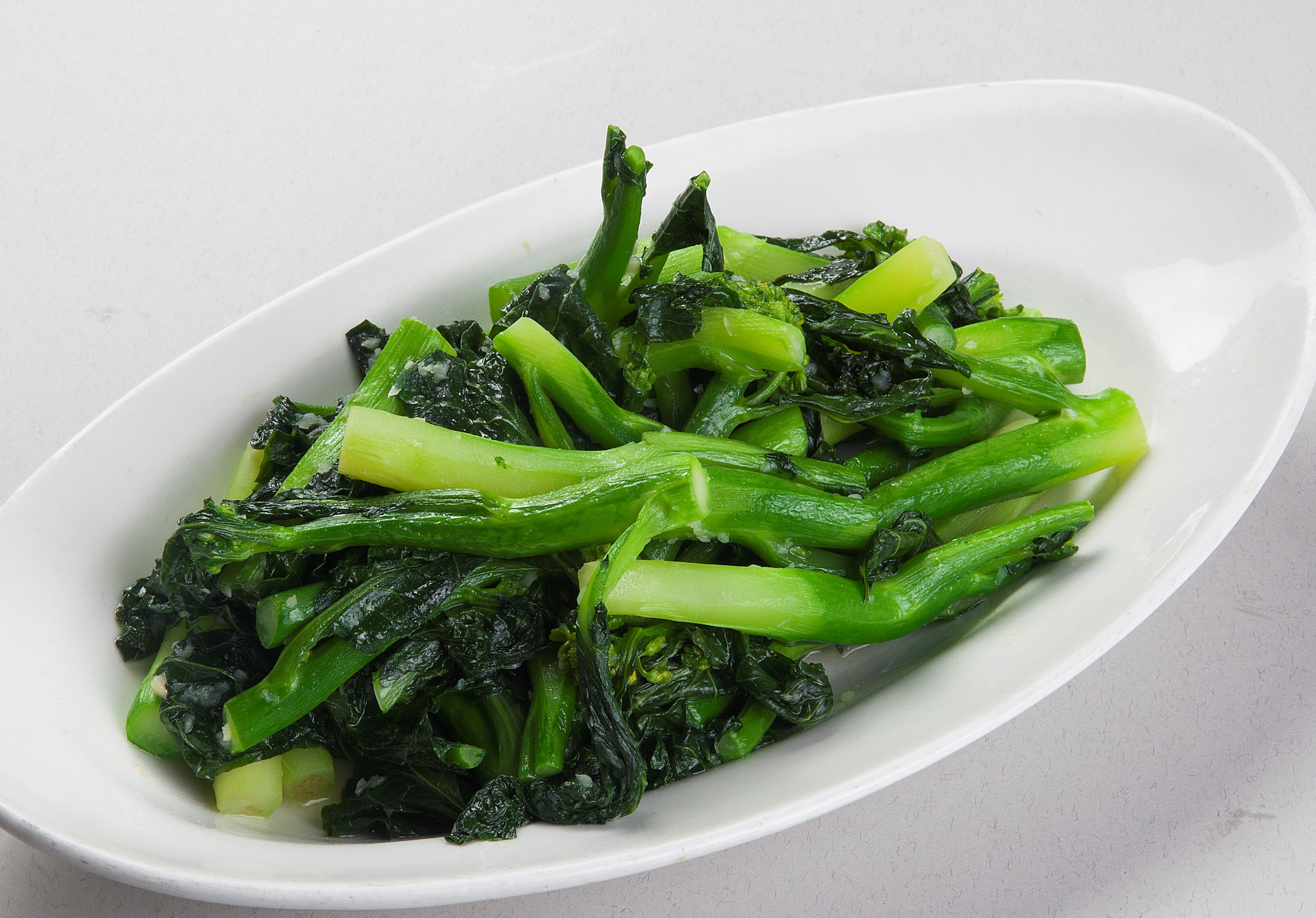 Order Stir-fried Chinese Broccoli with Garlic food online from Canaan Restaurant Chinese Cuisine store, West Covina on bringmethat.com