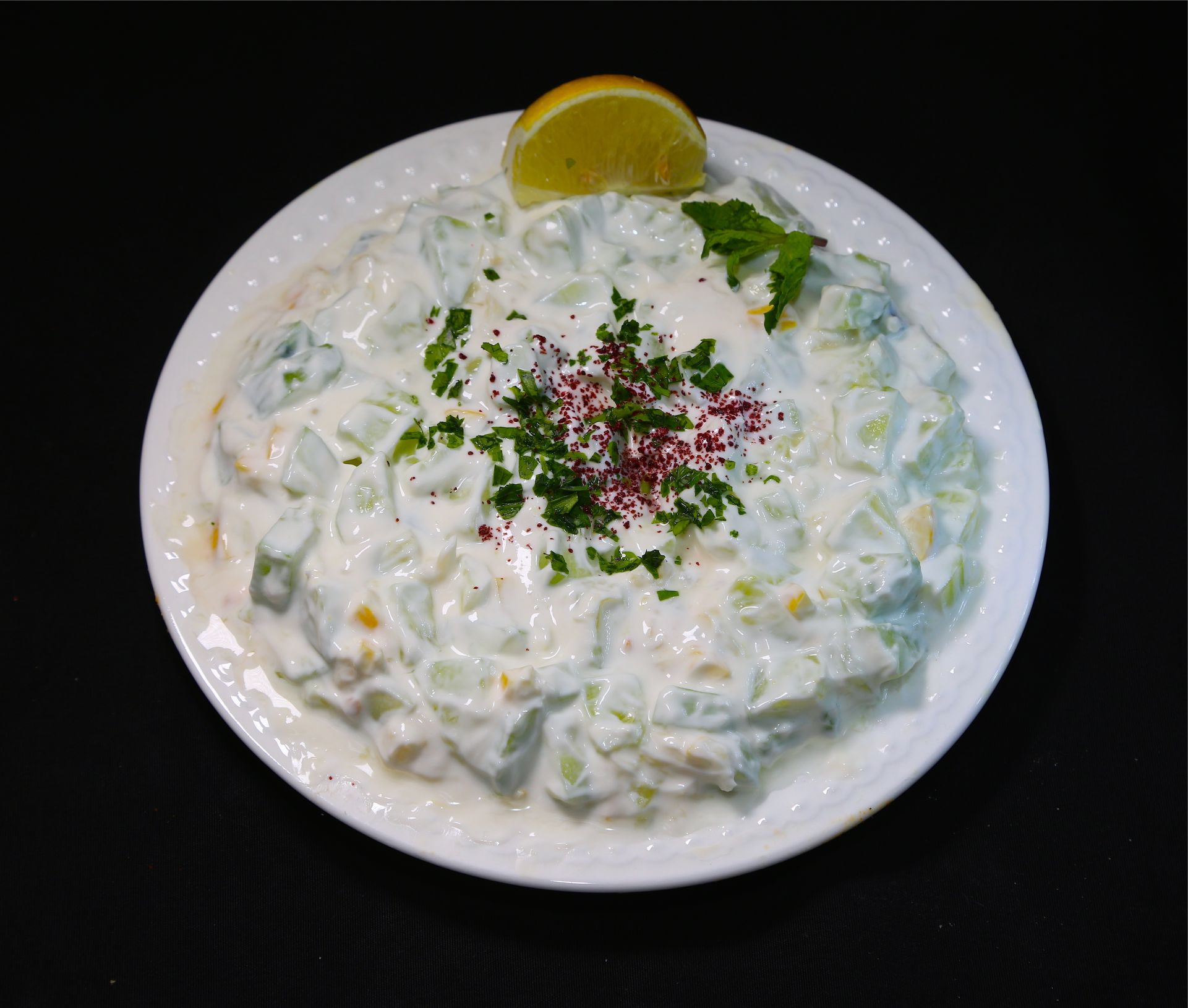 Order Cucumber -Yogurt Salad food online from Yaba’s Food & Middle Eastern Grill store, Chicago on bringmethat.com