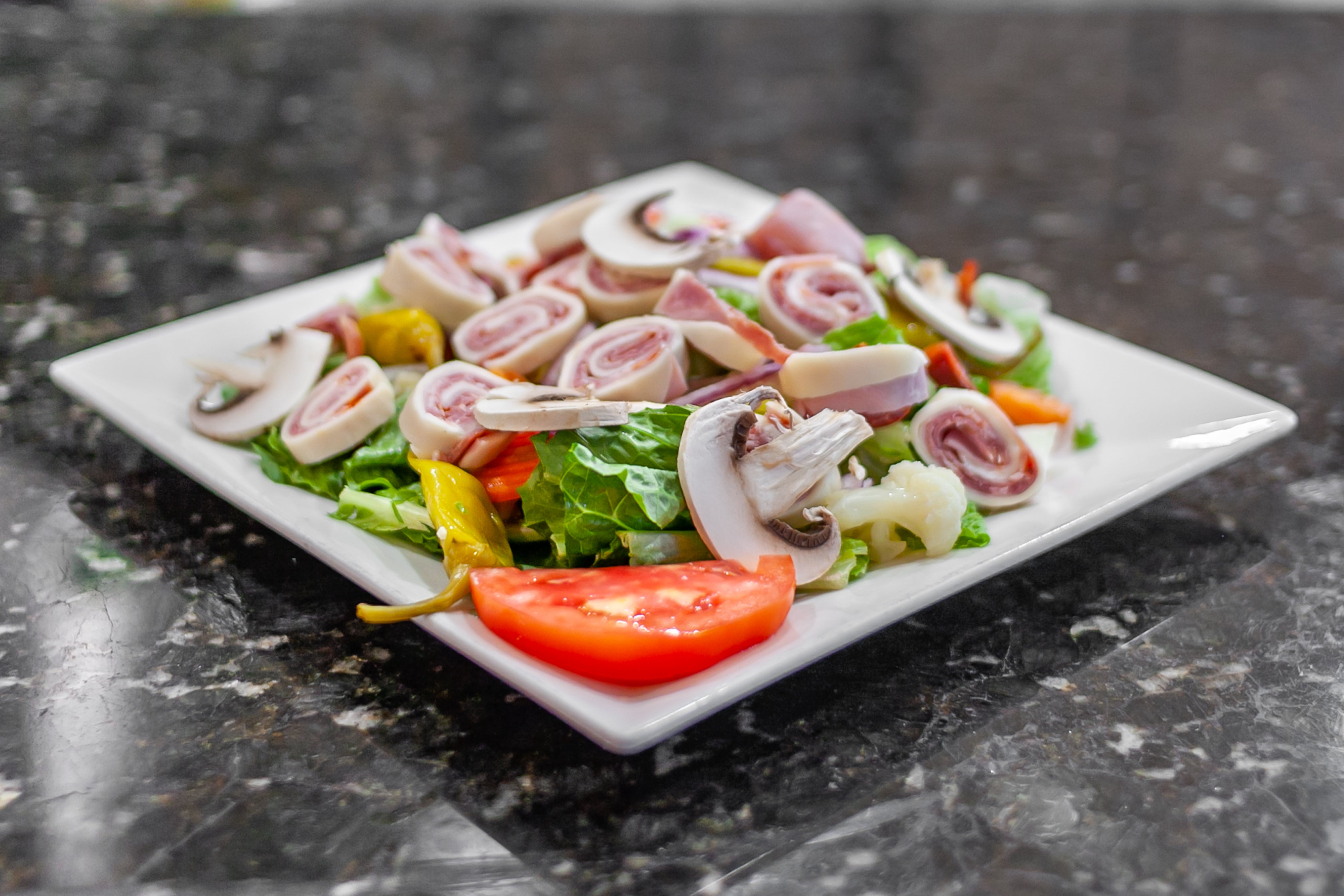 Order Antipasto Salad - Salad food online from Lello's Ristorante Pizzeria store, Rockledge on bringmethat.com