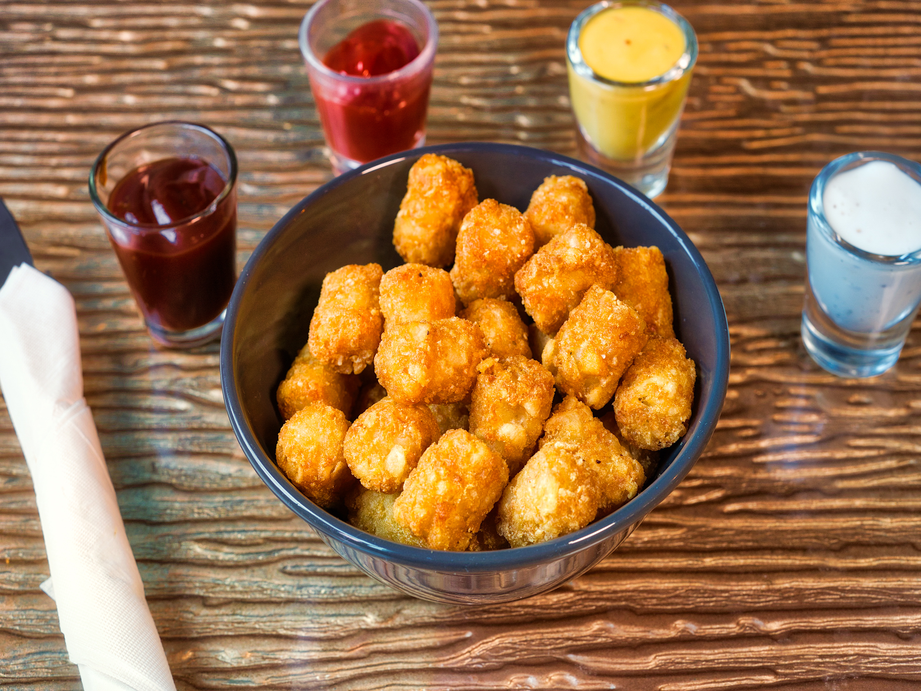 Order Tater Tots food online from Liberty Bar & Poutinerie store, Pontiac, MI on bringmethat.com