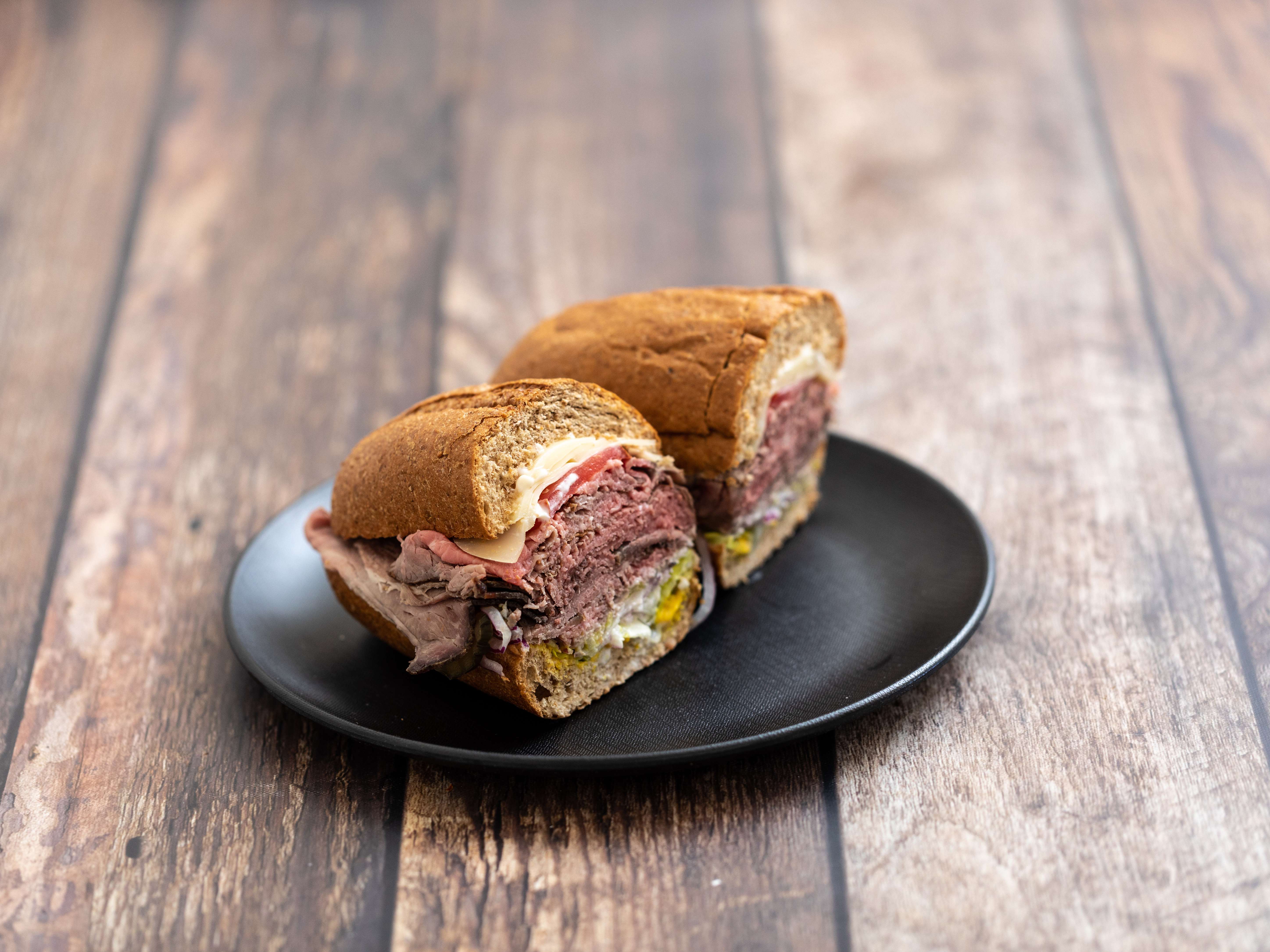 Order 11. Carroll's Roast Beef and Swiss Sandwich food online from Carroll's Meats, Deli, & Catering store, San Bruno on bringmethat.com