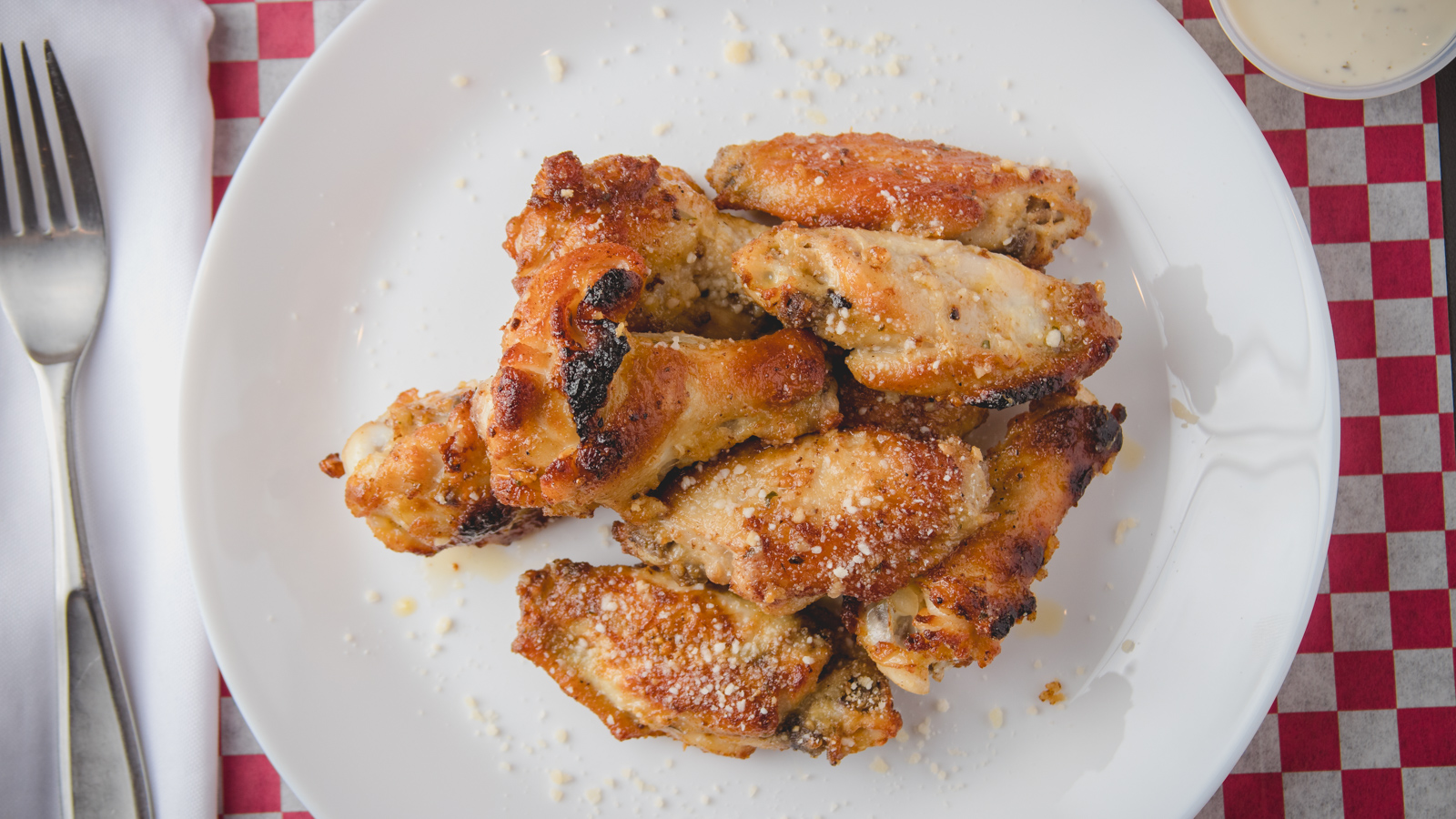 Order Wings food online from La Famiglia Wood Fired Pizzeria store, Humble on bringmethat.com