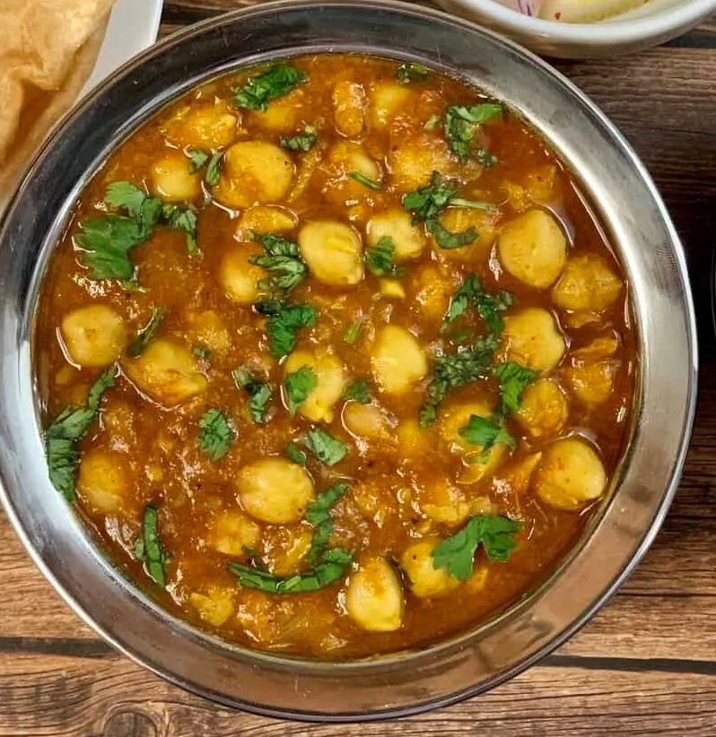 Order Channa Masala food online from Himalayan Yak & Yeti store, San Diego on bringmethat.com