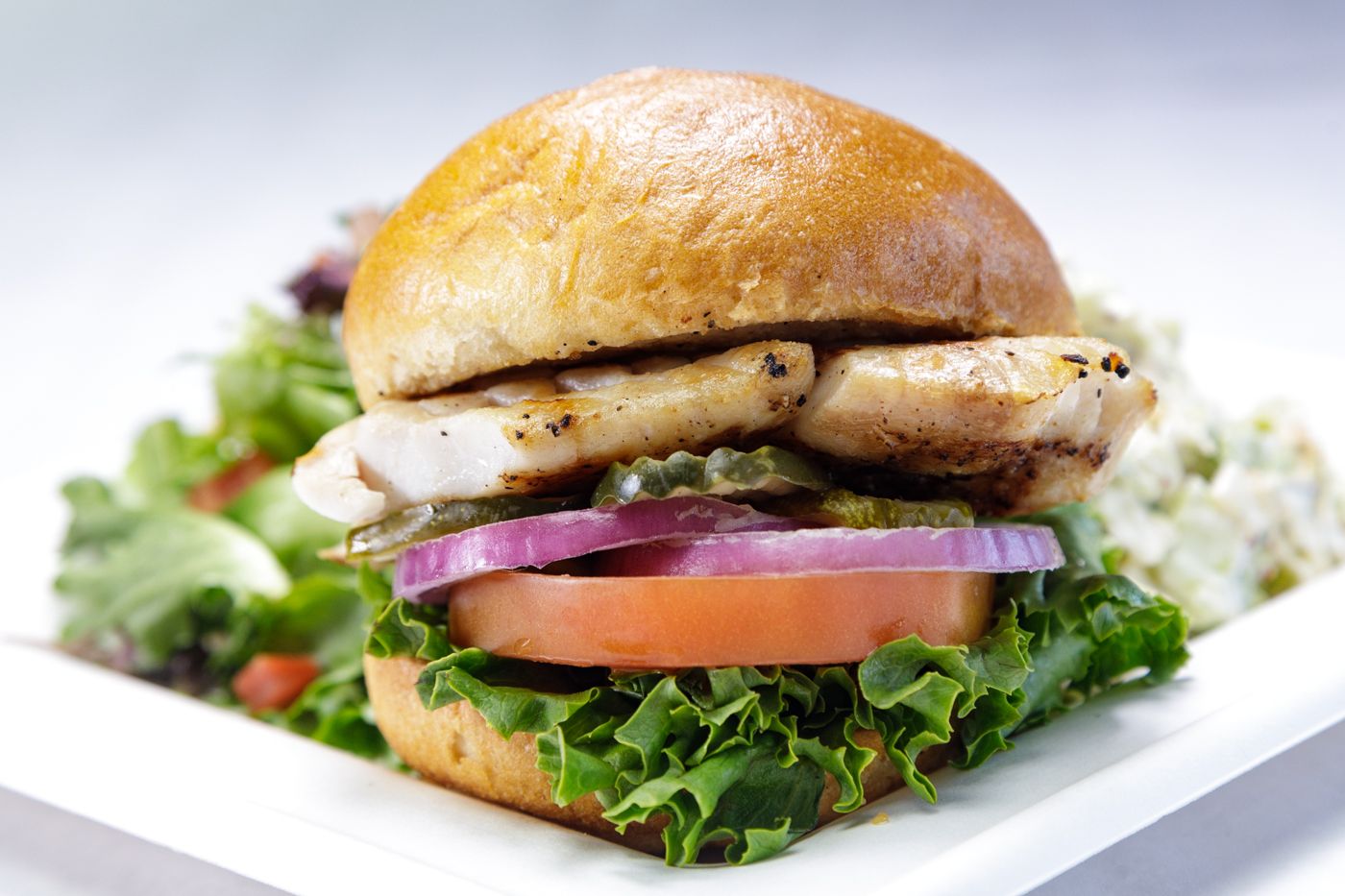 Order Red Snapper-Sandwich food online from Captain Kidds Fish Market & Restaurant store, Redondo Beach on bringmethat.com