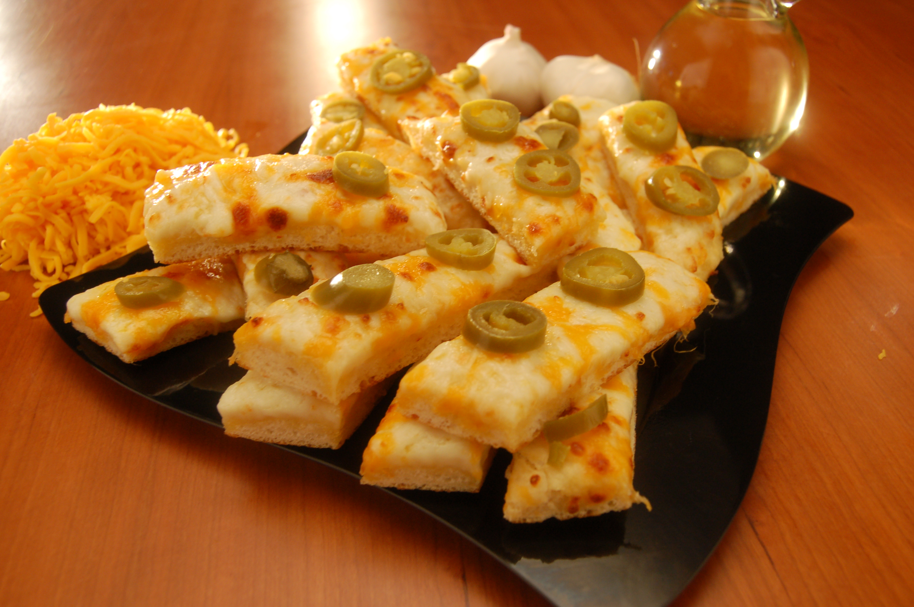Order Jalapeno Bread food online from Cheezie Pizza store, Wichita on bringmethat.com